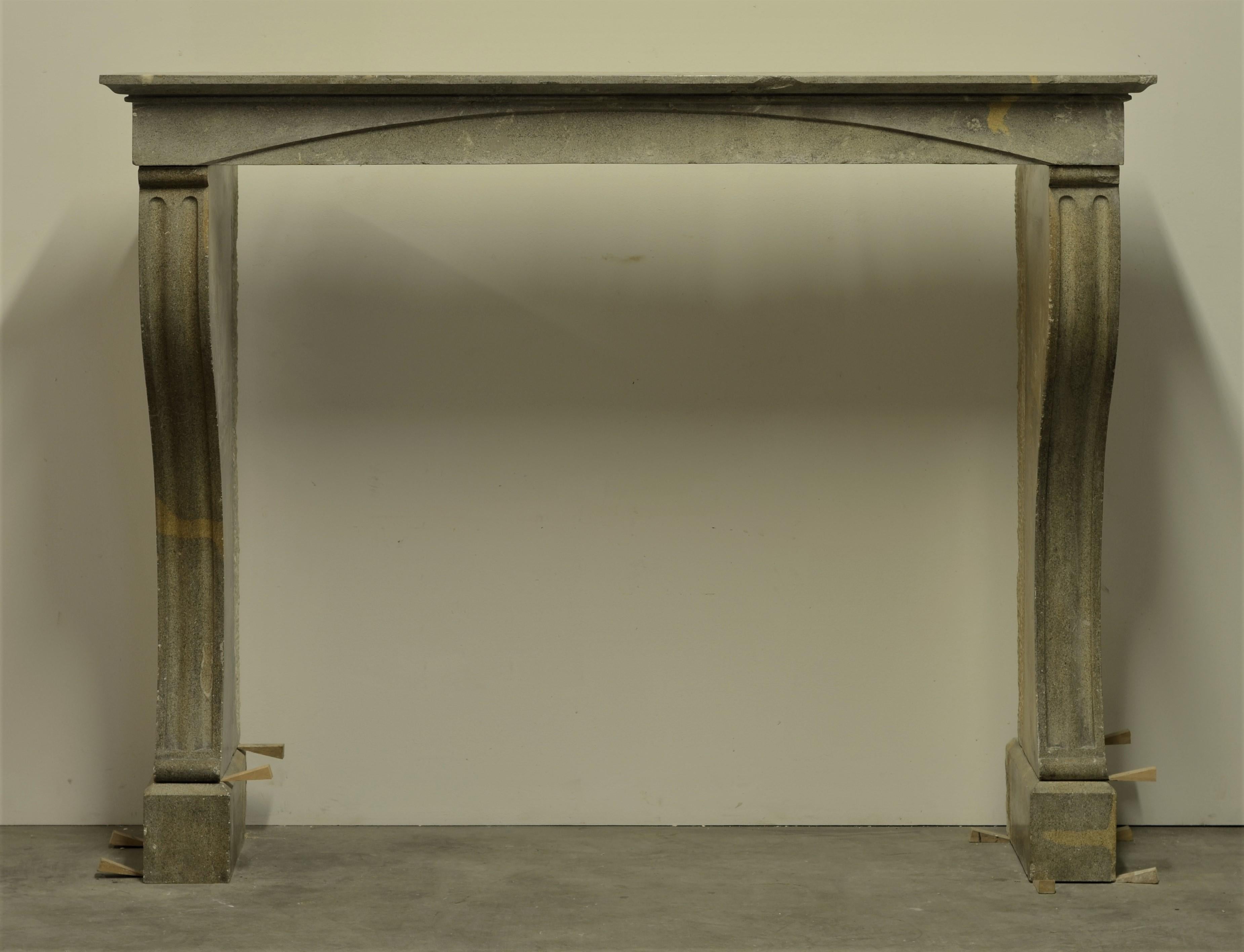 Solid, elegant bi color limestone French antique fireplace, 19th century.

Opening measurements: 44.48 x 49.2 inch. (113 x 125) height x width.
This lovely fireplace is sold by Schermerhorn antique fireplaces.