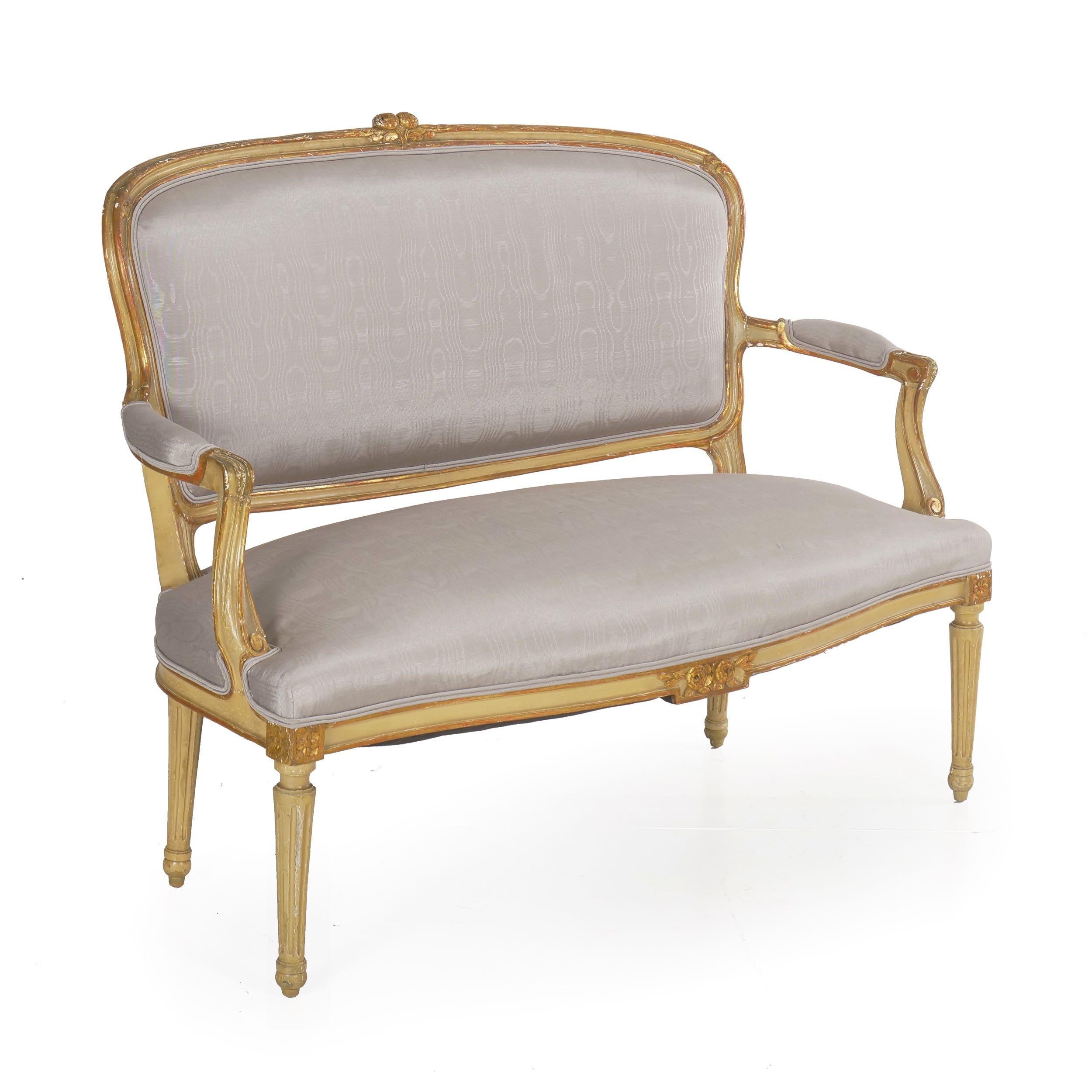 French neoclassical carved and painted beechwood settee,
circa late 19th century
Item # 007CPB30K

This fantastic 19th century settee is carved in the taste of the Louis XVI period with the typical fluted legs, cabriolet arm supports, and simple