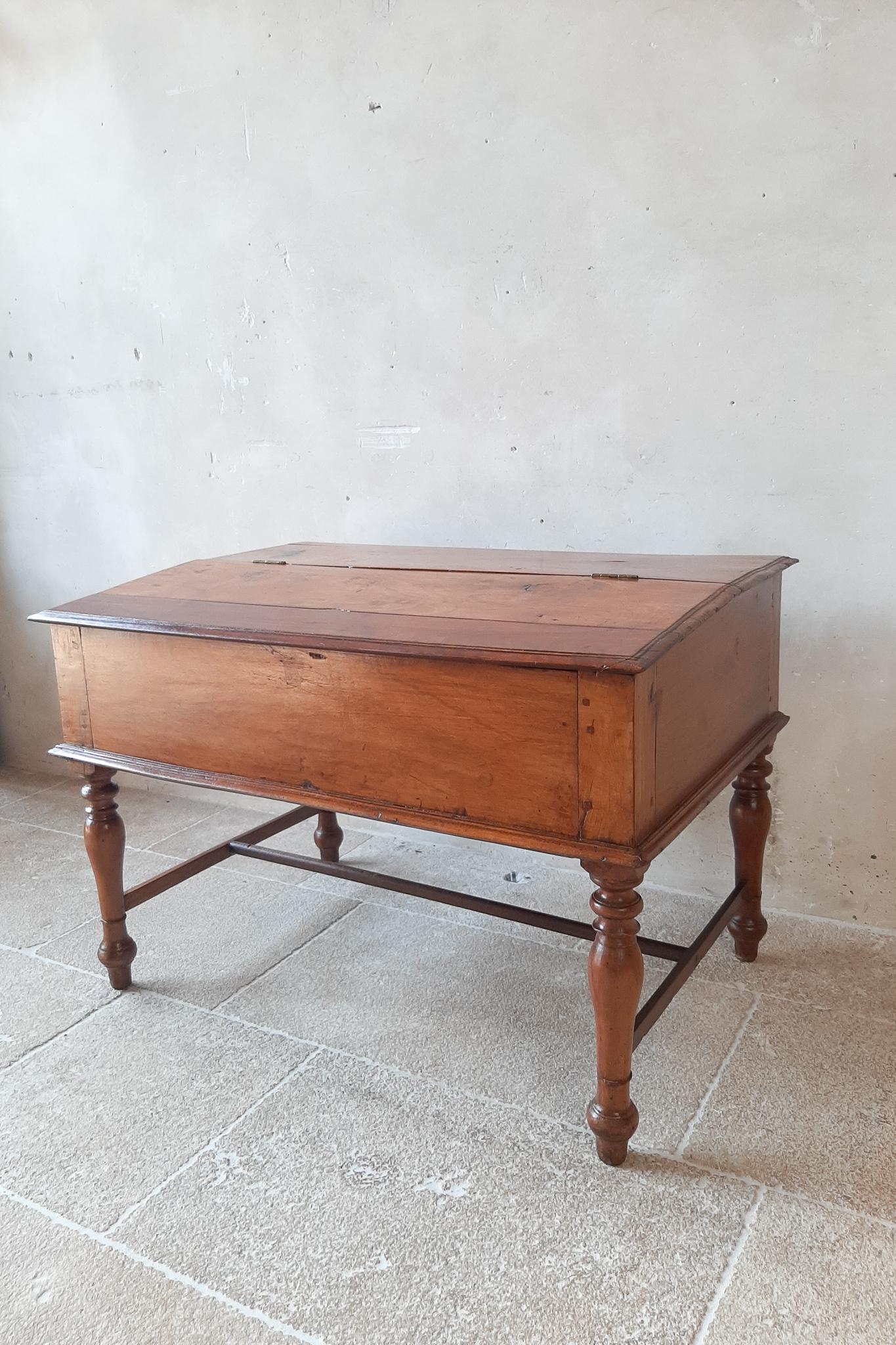 19th century antique French mahogany wooden, low by the ground, childrens writing desk. This lift top desk has a little drawer and secret compartments. Lovely in a children's room, but also very good usable as a coffee table or side table. The