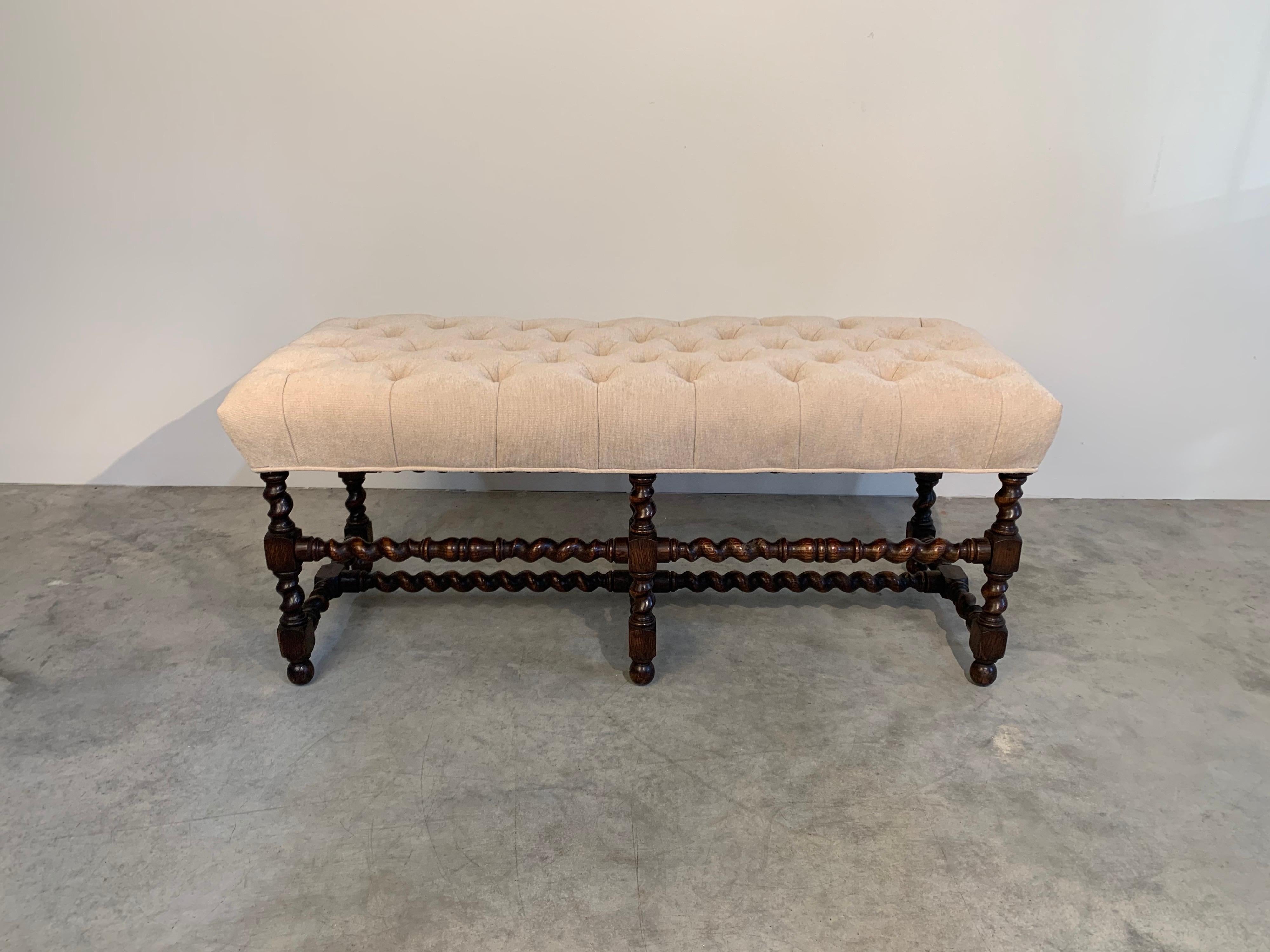 Handsome turnings, quality joinery and a well-padded, upholstered slip seat make this sturdy bench a welcome addition to a family room or bedroom.
Newly upholstered in stunning off white high end textile fabric. A blend of cotton and polyester. New