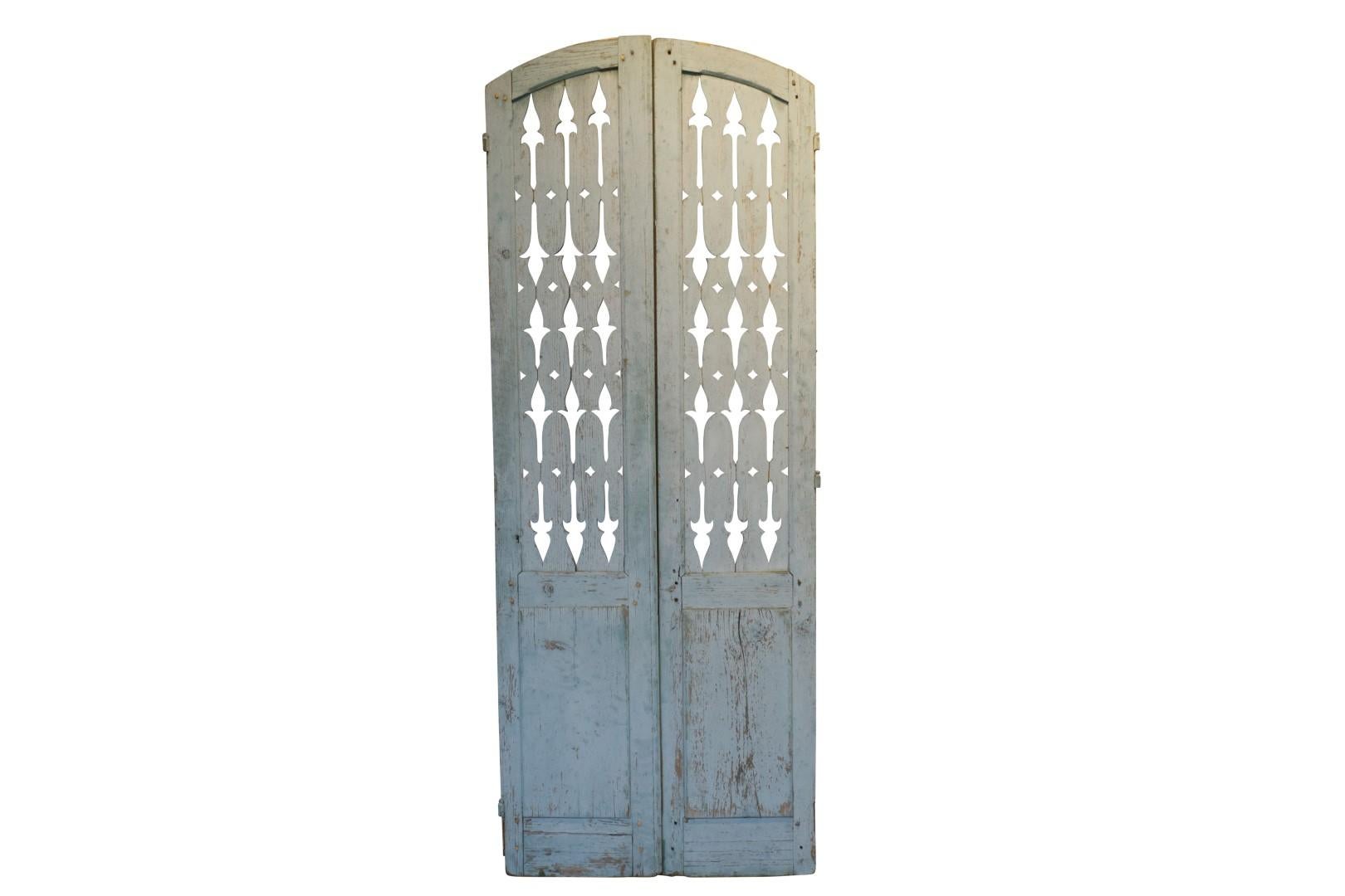 This pair of antique French shutters were rescued from a French Villa in Lyon. The beautiful blue grey patina is original and remains intact, circa 19th century. Double pair only.