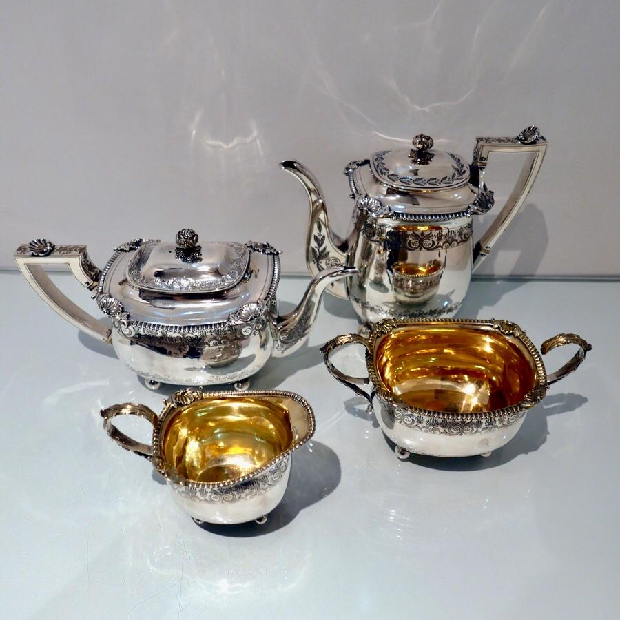 A fine and extremely good quality Georgian silver tea and coffee set decorated with truly beautiful heavy shell and gadroon borders and intricate bright cut engraved galleried bands. The interiors of the sugar and cream have been elegantly gilt.

