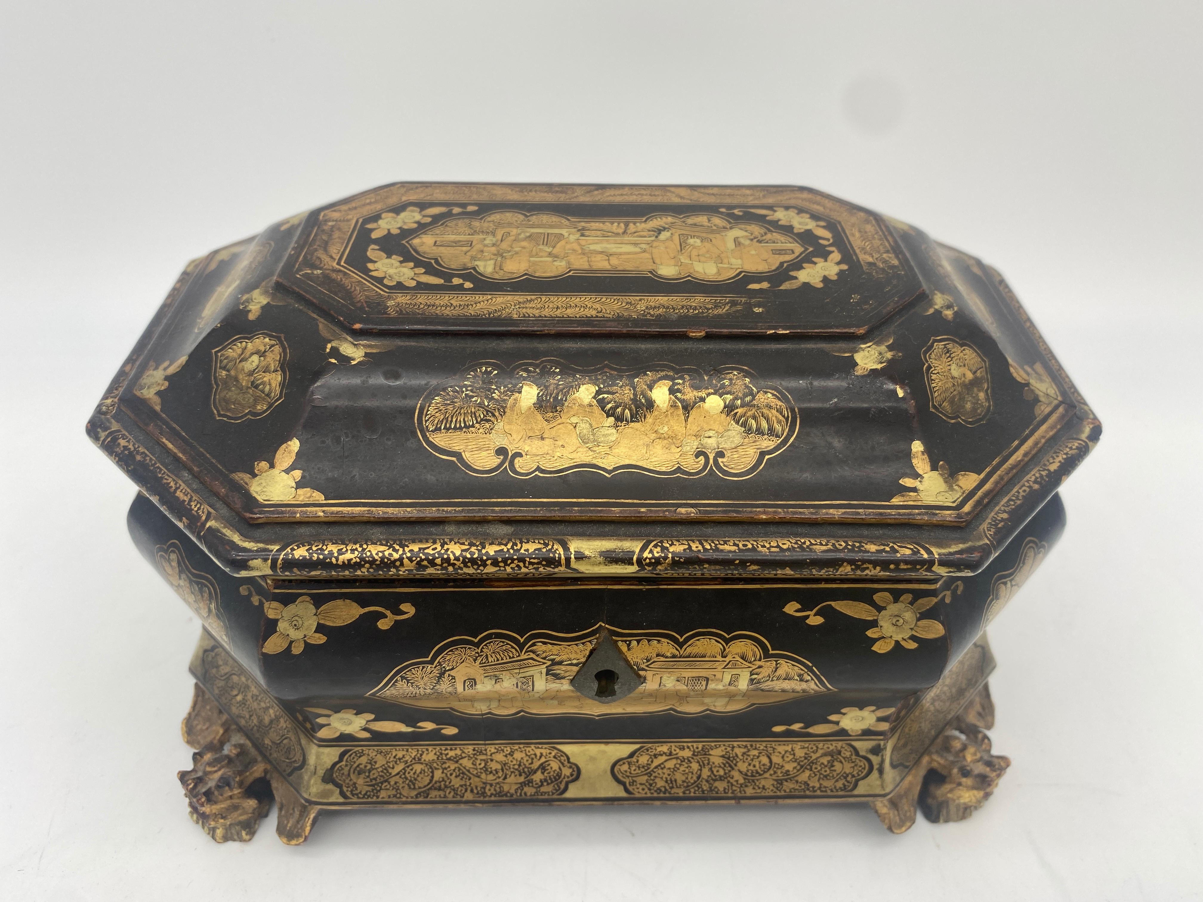 19th century golden black lacquer Chinese tea caddy with two pewters with 4 foots, the gilt body decorated with panels of landscapes, two pewters with covers, one pewter lead ring break down, otherwise it is very beautiful small piece. See more