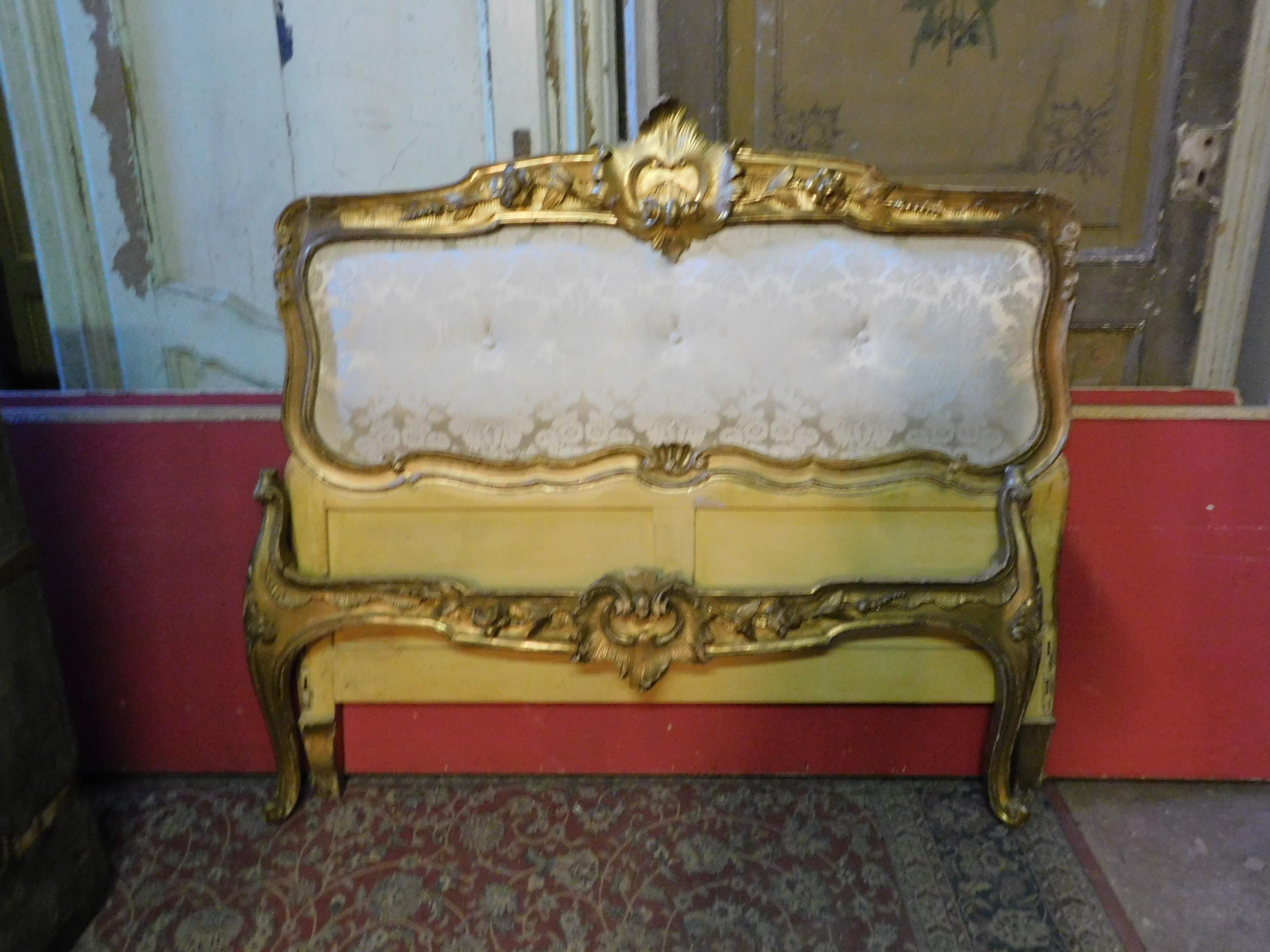 19th century antique golden bed with damask lined headboard, complete with sides, from Naples.