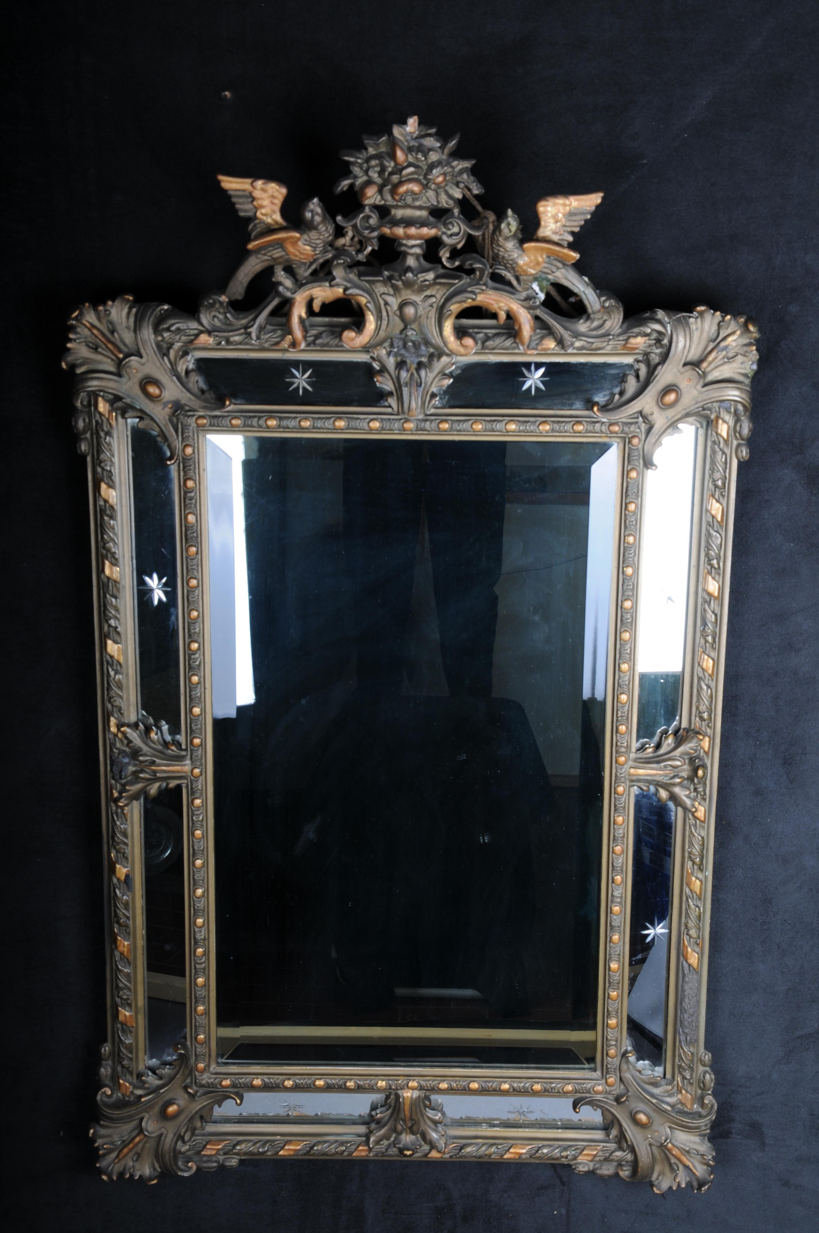 Antique historicism mirror, around 1870, gilded.

Richly decorated mirror in historicism around 1870. Framed mirror with rich decorative elements. Body completely set in gold. Please refer to the detailed pictures for the condition.
