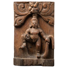19th century Antique Indian wooden temple panel with Bala Krishna