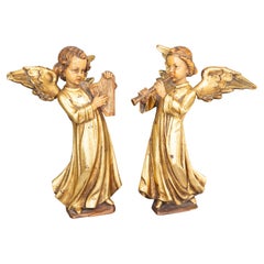 Pareja de figuras de ángel doradas italianas del siglo XIX