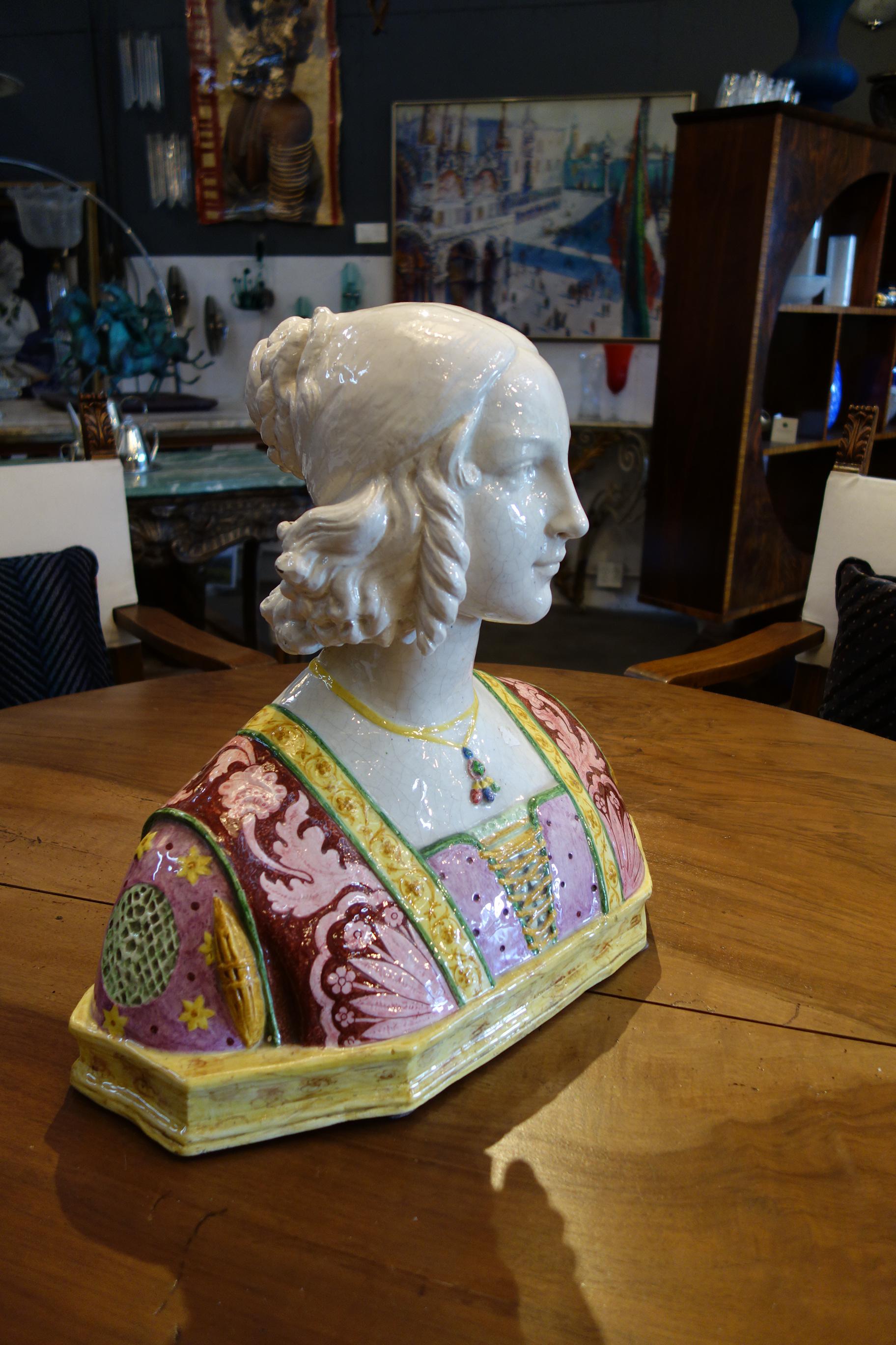 Renaissance style Majolica glazed ceramic handcrafted bust of a lovely Florentine Madama.

Measures: 20” width, 19.5” height, 10” depth.