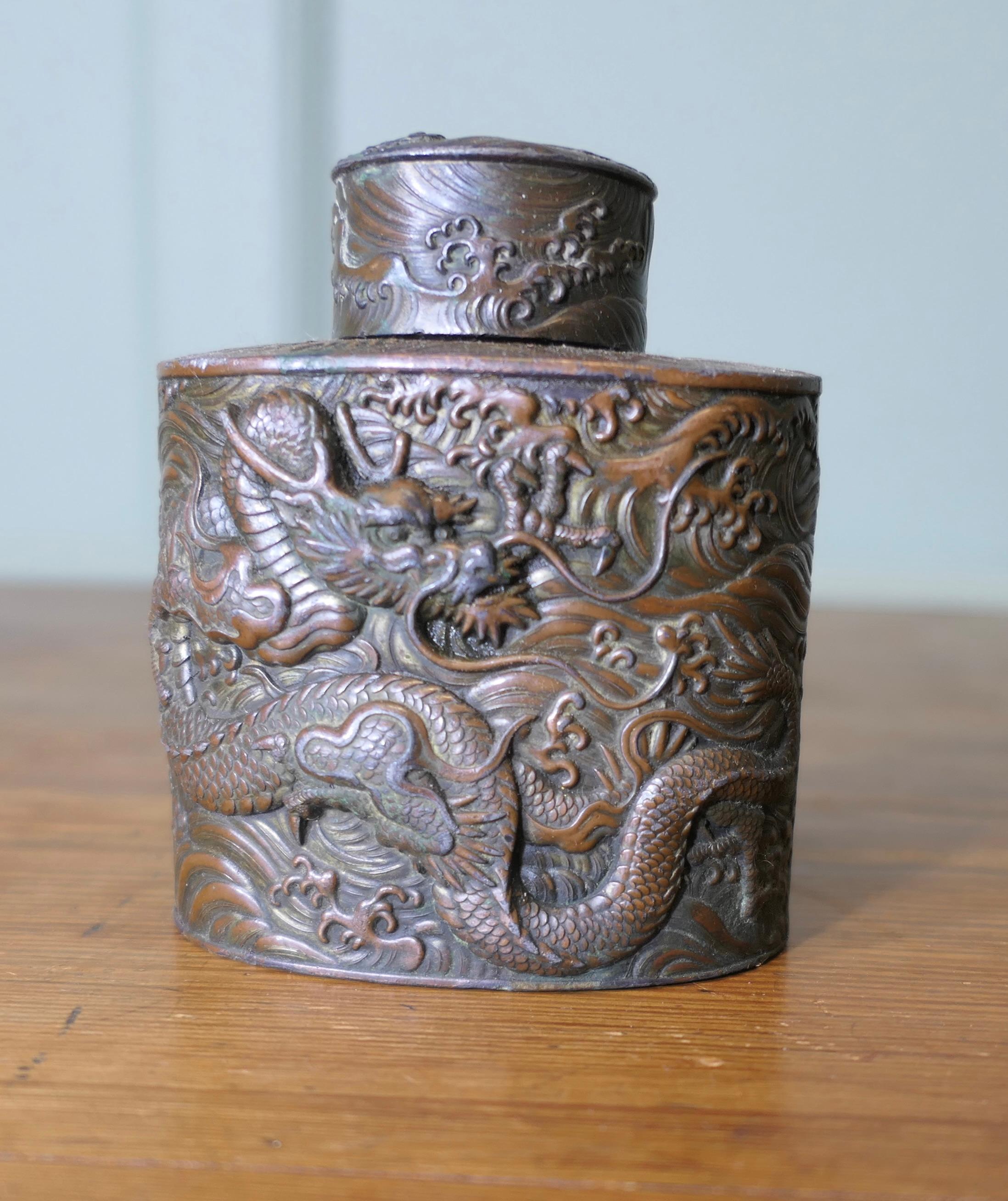19th Century Antique Japanese Silver Plated Tea Caddy 

This very elaborate piece is decorated with Dragons. 
it is silver-plated on copper, it is in sound condition but much of the silver plate has worn away

The Caddy is 5