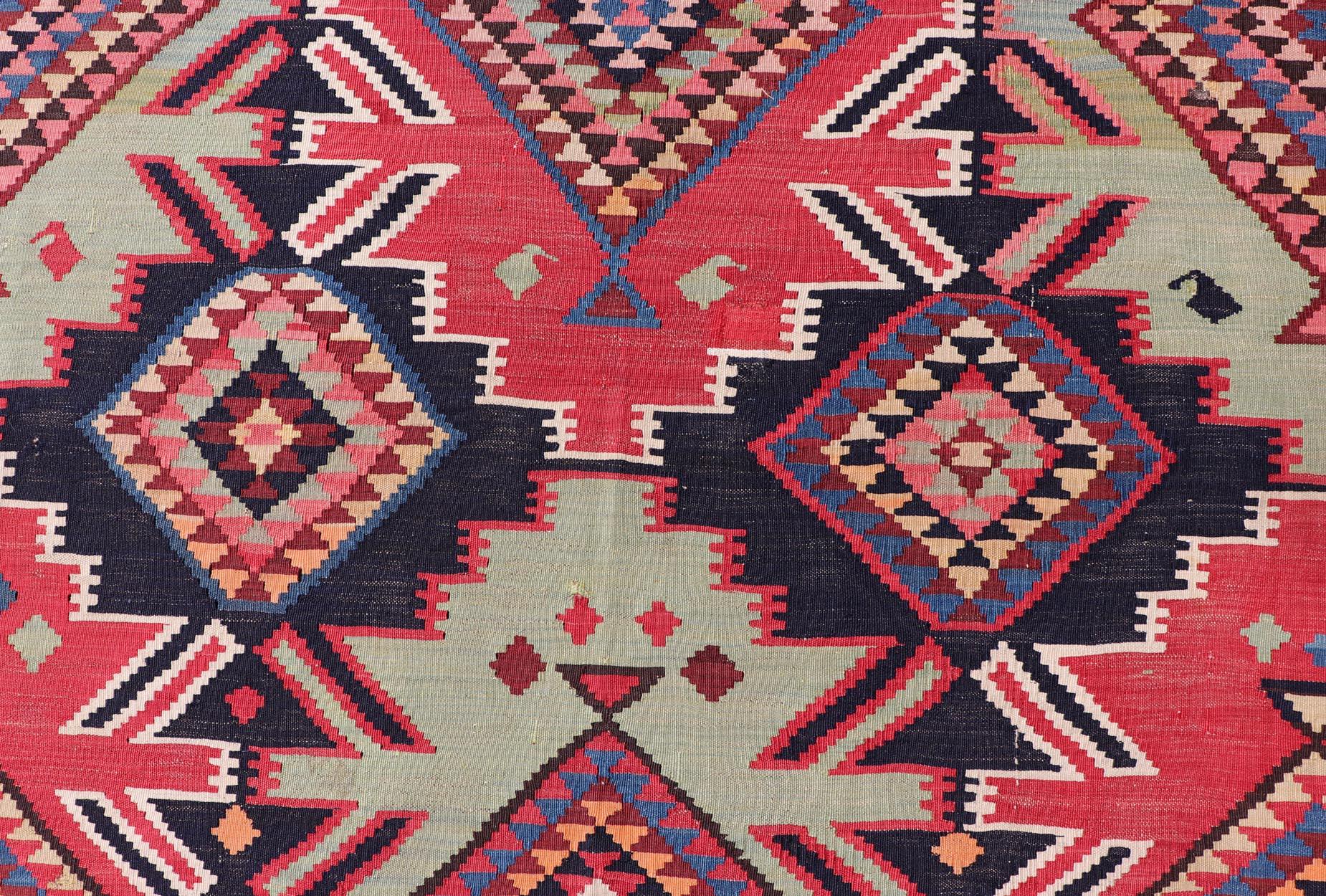 Antique Kuba Kilim Gallery Rug in with large scale Geometrics and Vibrant Colors, 19th century. Keivan Woven Arts / rug R20-1203, country of origin / type: Caucasus/ Kuba , circa 1890

Measures: 6'0 x 12'8 

This beautiful late 19th century