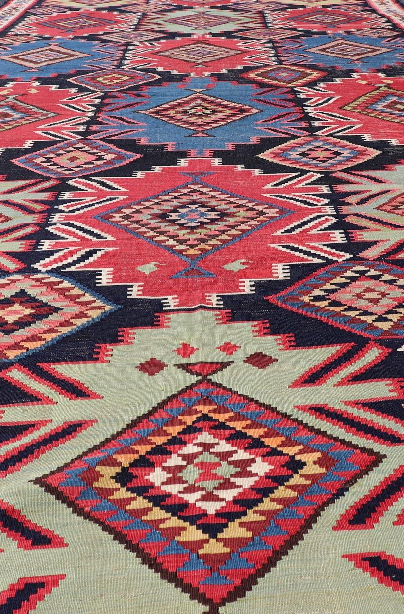 Wool 19th Century Antique Kuba Kilim Gallery Rug in with Vibrant Colors For Sale