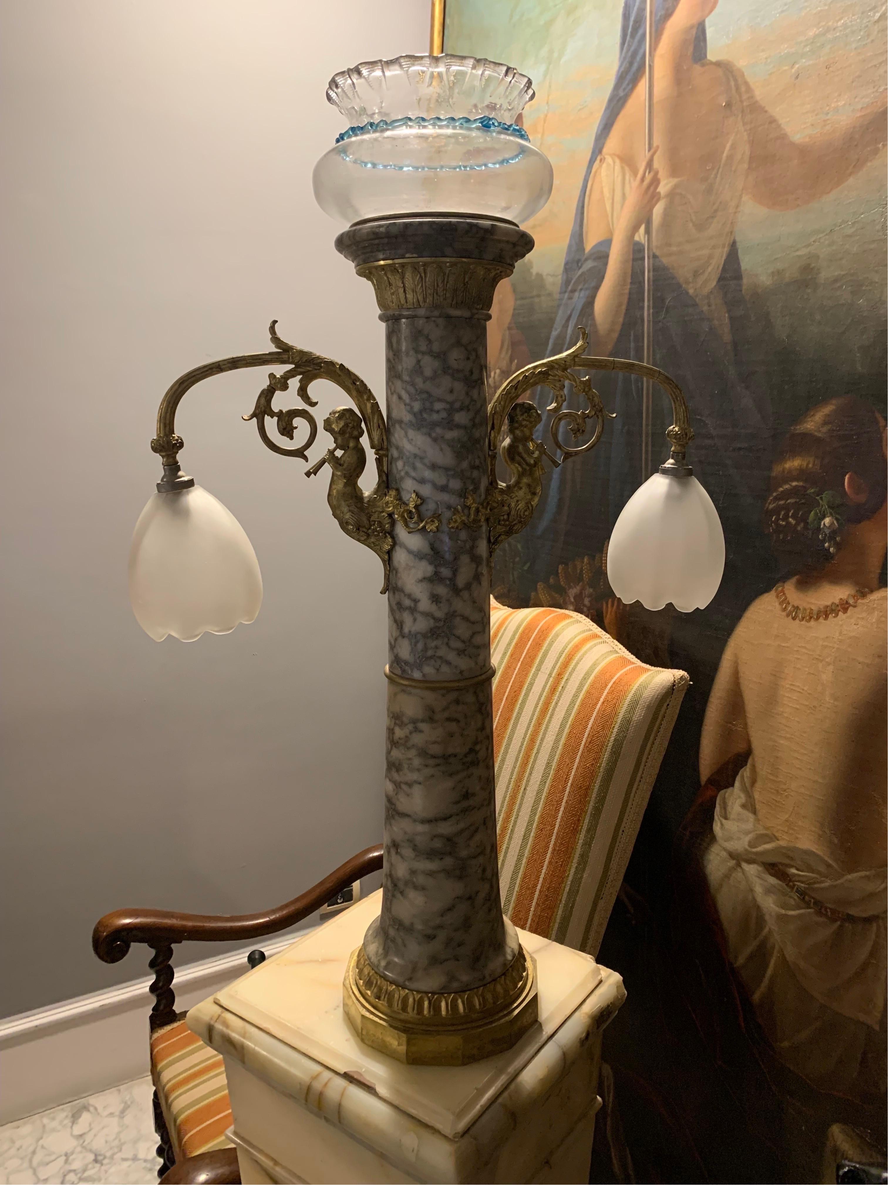 Fantastic lamp in alabaster marble and bronze. Nineteenth century. Dimensions: 82 cm x 54 cm x 21 cm.