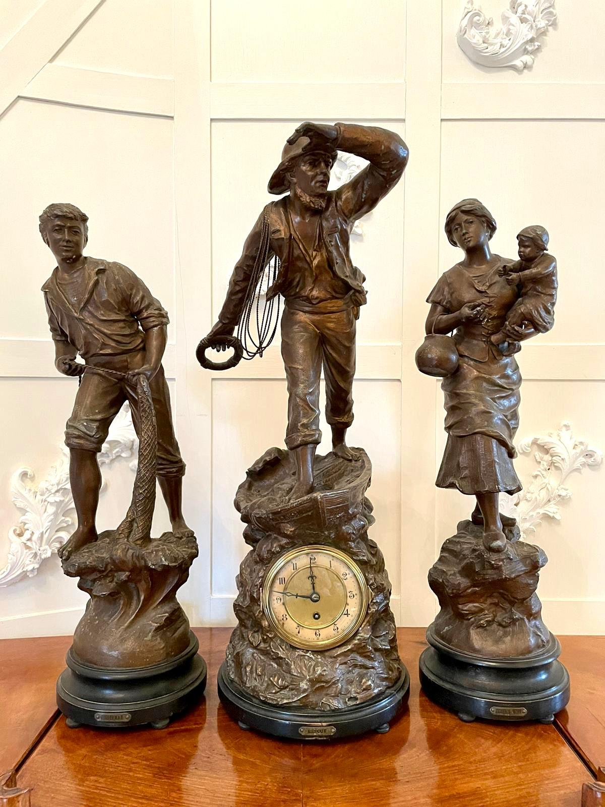 19th century fine antique large French three piece clock set having a fisherman in period dress standing in a boat and looking out to sea supported by a round wooden plinth on top of an eight day French movement with an impressive brass face,