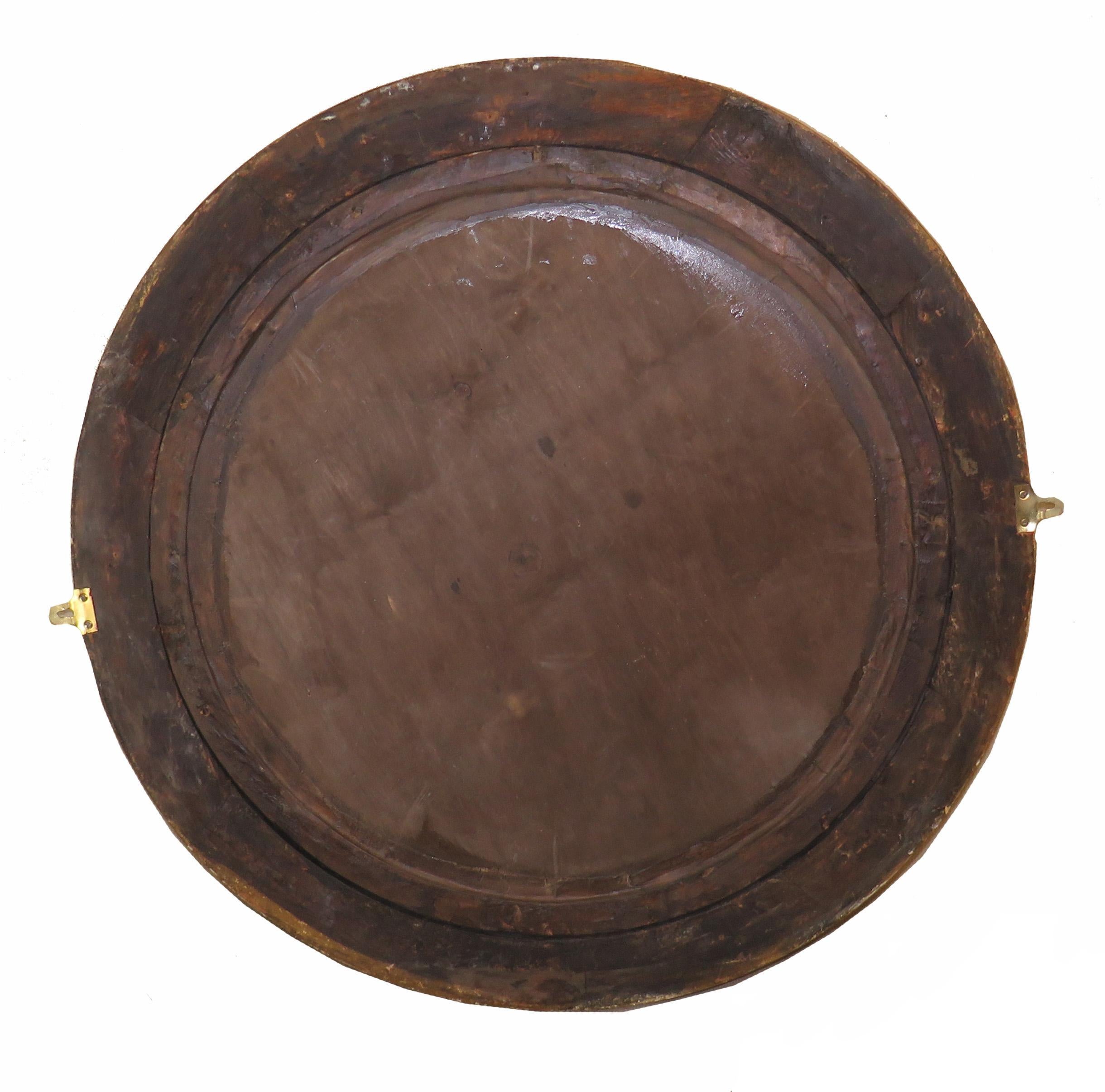 A very attractive mid-19th century giltwood circular
convex mirror of unusually large proportion having
carved decoration to moulded frame and replaced
convex mirror plate

(This charming convex mirror is unusually large and
would be the