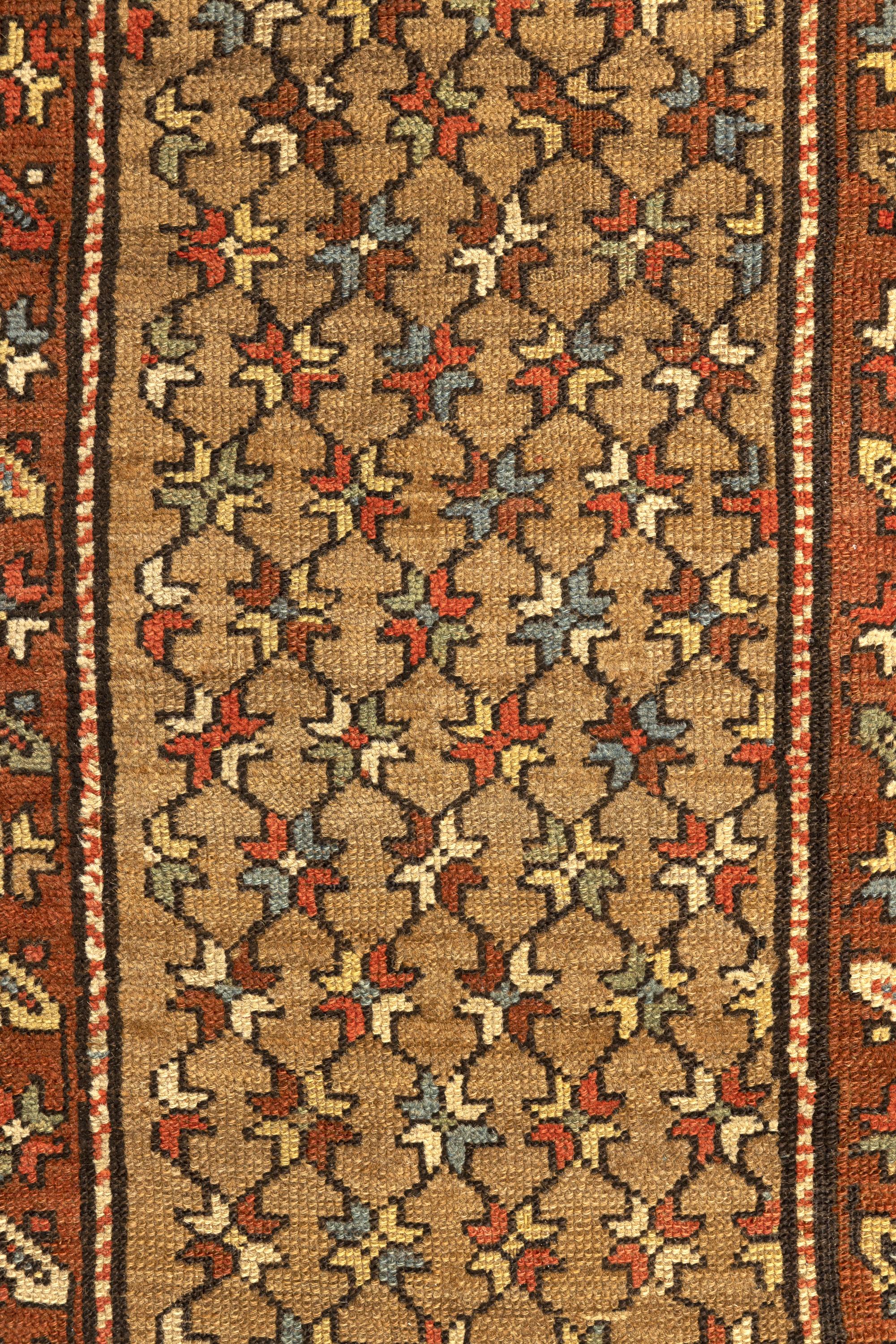 Lori – West Persia

This is an excellent antique Persian Lori made with artistic mastery. It features an all-over pattern of colourful flowers intertwined in a dark beige shade throughout its central field. It is surrounded by three beautiful rust,