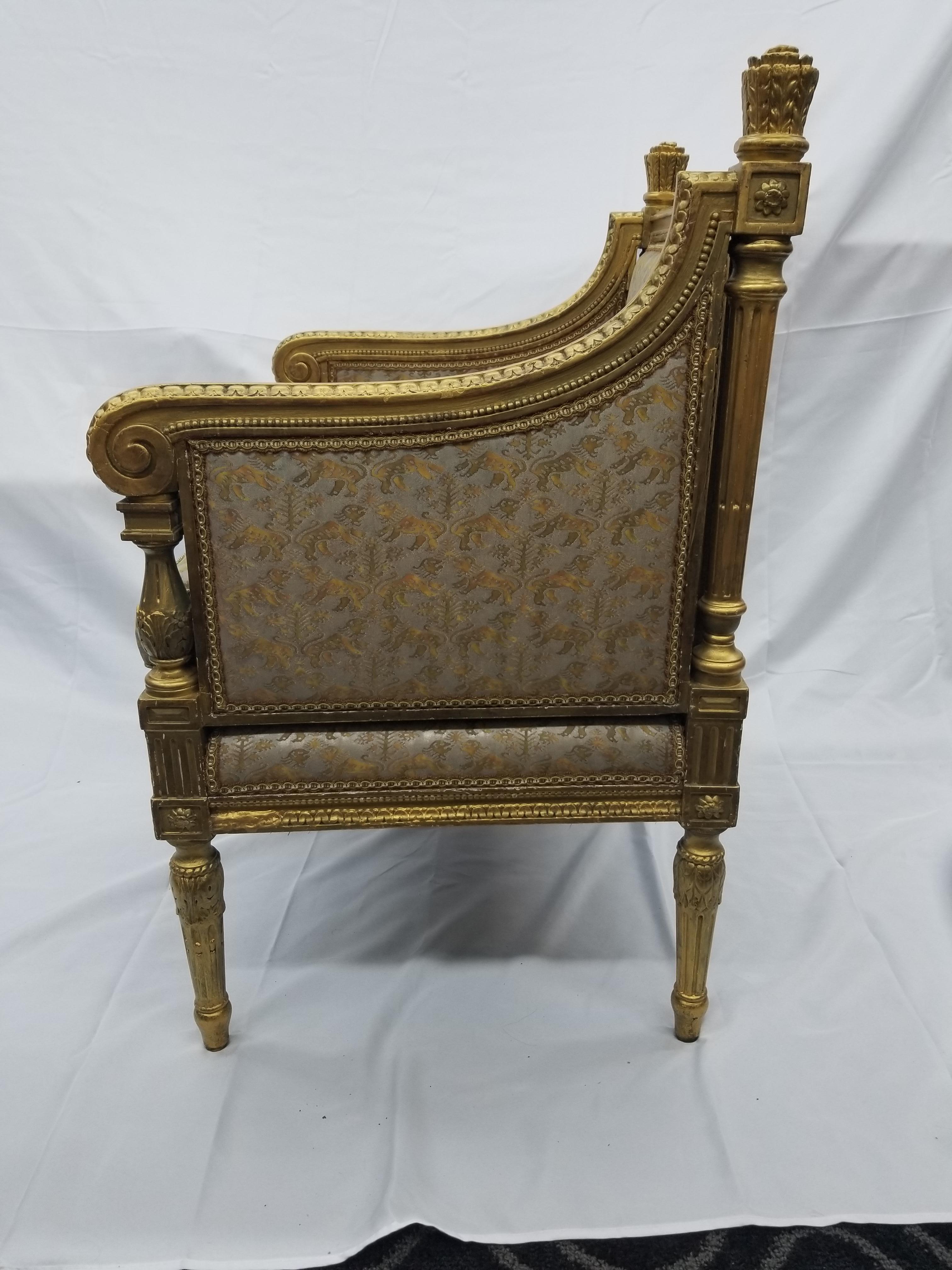 Classic 19th century Antique Louis XV Throne chair set. Crafted arms and decorative fleuer design add regal beauty to this antique collectible. Recent reupholster with metallic lion design and refreshing gold/bronze accent paint make this truly a