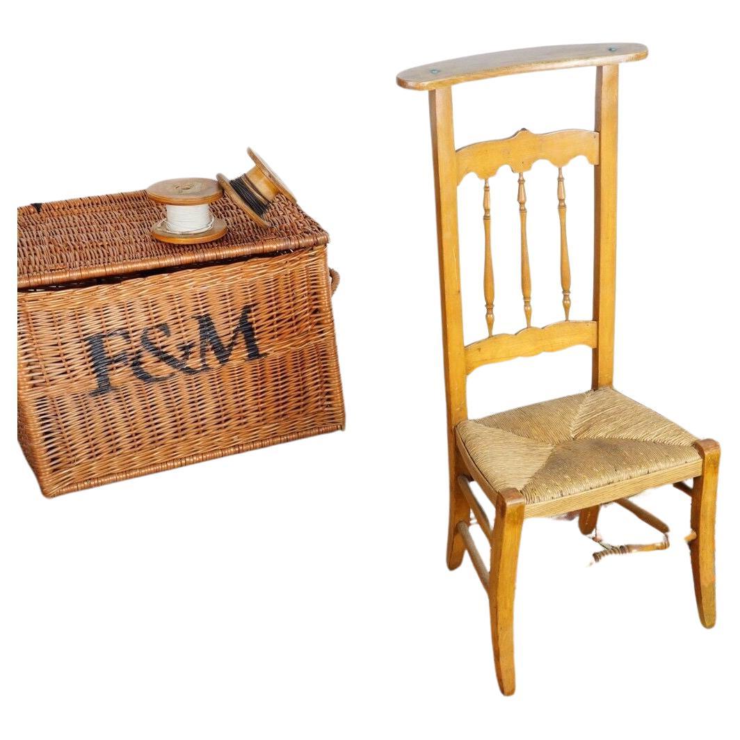Arts & Crafts Liberty & Co Rush Seat Accent Bedroom Chair

Arts and crafts movement early 20th century Prie Dieu accent nursing chair or bedroom chair with rush seat,
made by Liberty and Co. The chair carries an original stamp. 

Dimensions (cm):