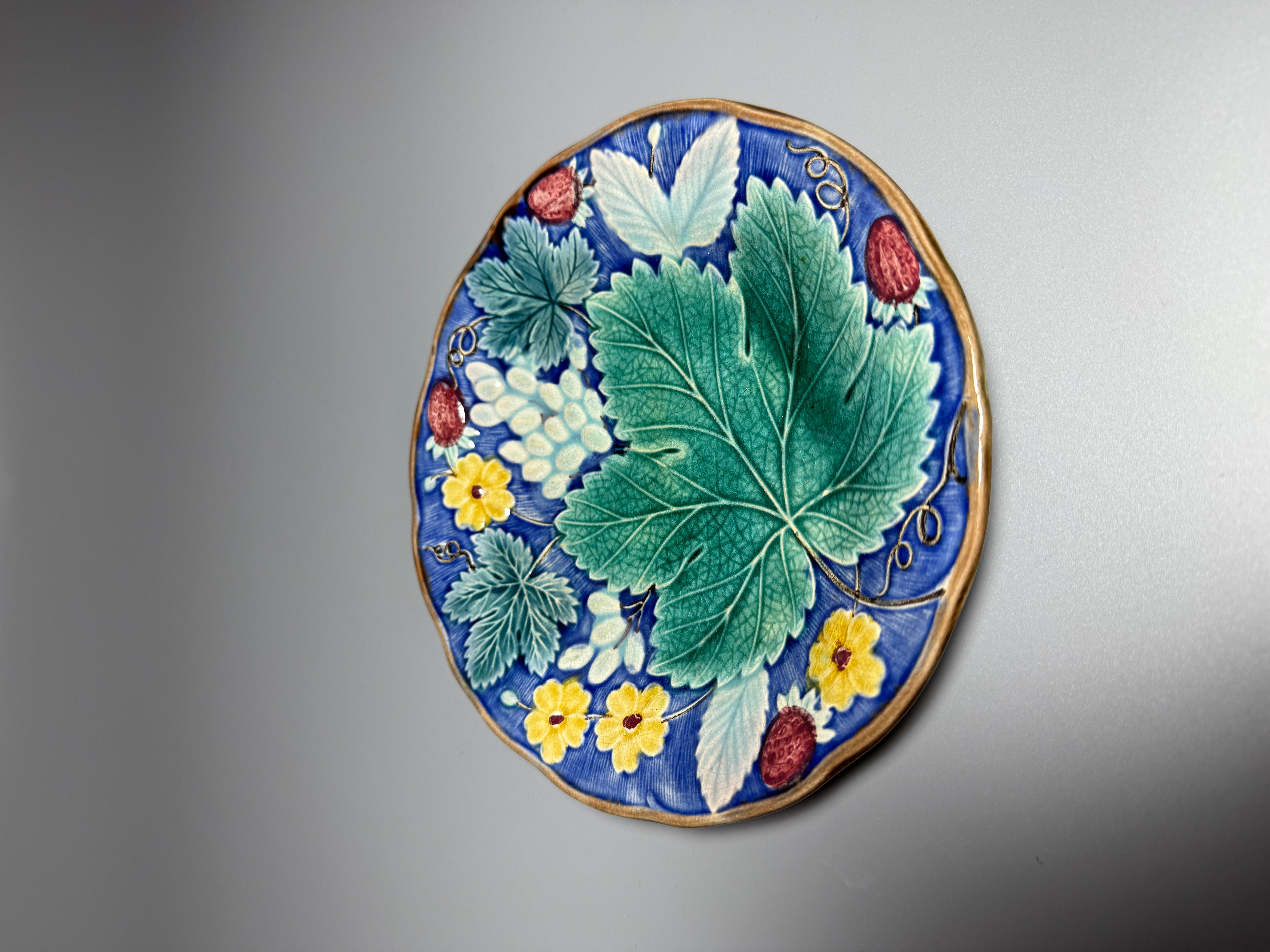 Rare exemplar of antique majolica Gustavsberg Sweden
1860-1890 according mark
A fantastic antique majolica plate, d 18 cm ( 7,08 inches)
A beautiful rich floral design with high gloss glazed finish. 

In very good condition with any damage 
Please
