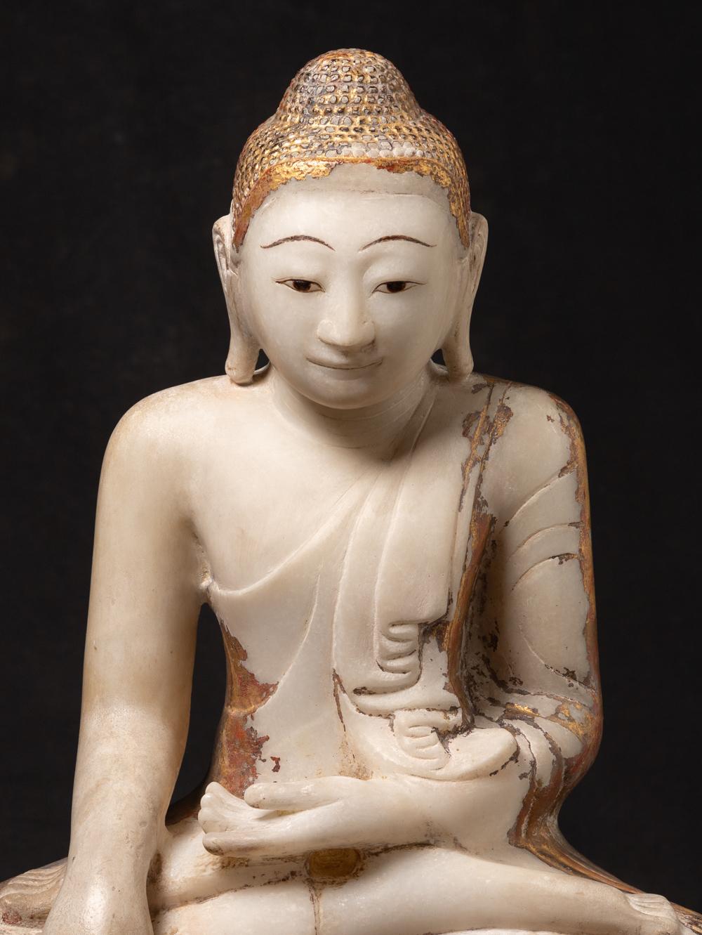 Material : marble
58,5 cm high
50,5 cm wide and 24 cm deep
With traces of the original lacquer and 24 krt. gilding
Mandalay style
Bhumisparsha mudra
19th century
Weight: 49,75 kgs
Originating from Burma
Nr: 3664-3