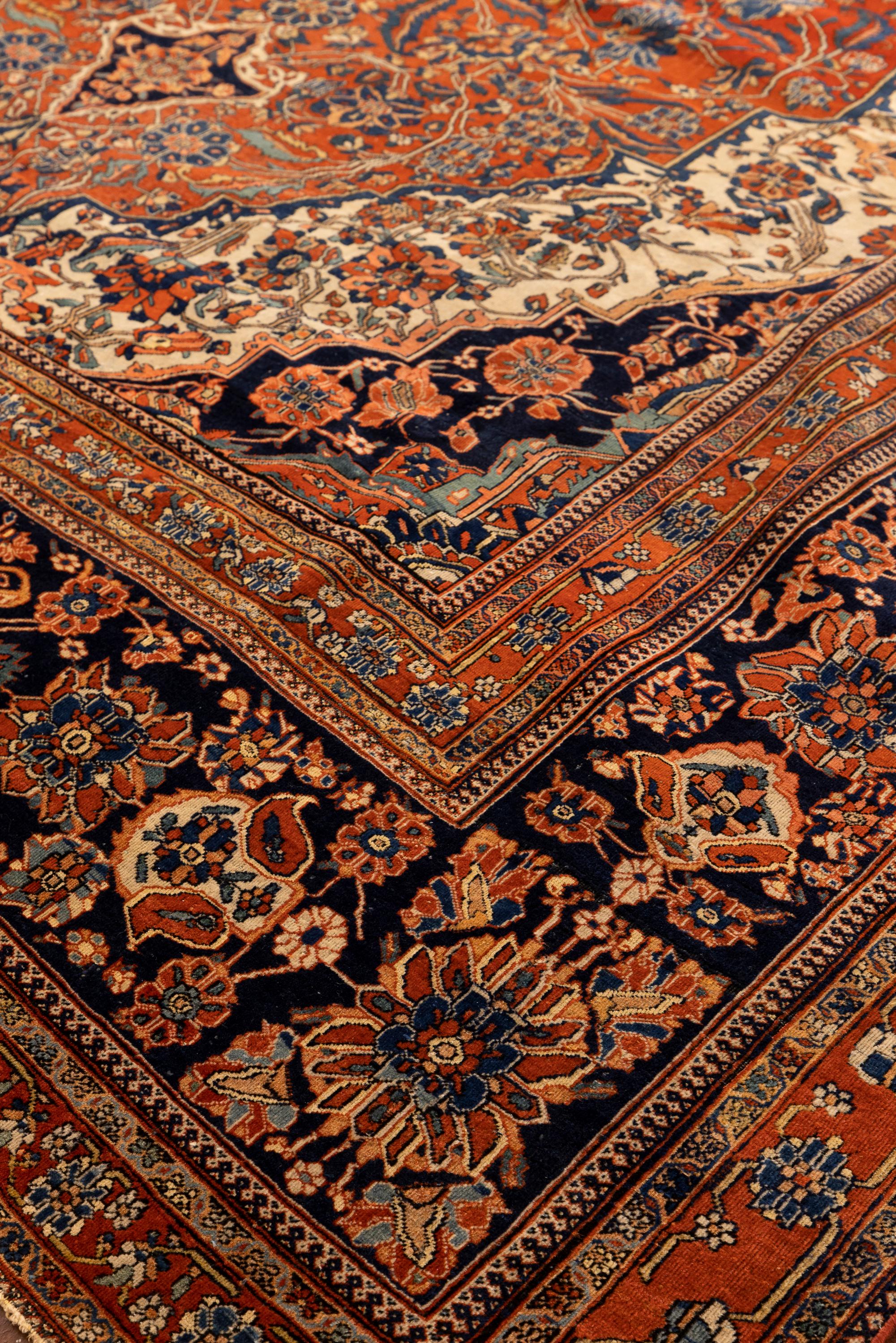 Alfombra antigua Mohtasham Kashan del siglo XIX en lana azul marino, óxido y marfil Lana en venta