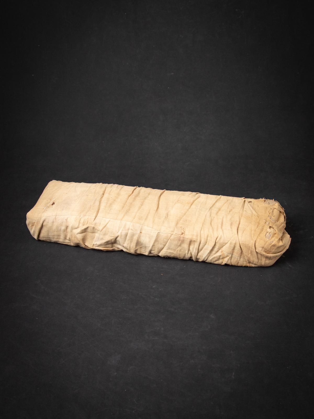 The Antique Palm Leave Manuscript book is a remarkable significant artifact originating from Burma. Crafted from Palm leaves & wood, it stands at 14 cm in height and measures 51 cm in width and 6,8 cm in depth. 

Created in the 19th century, Was
