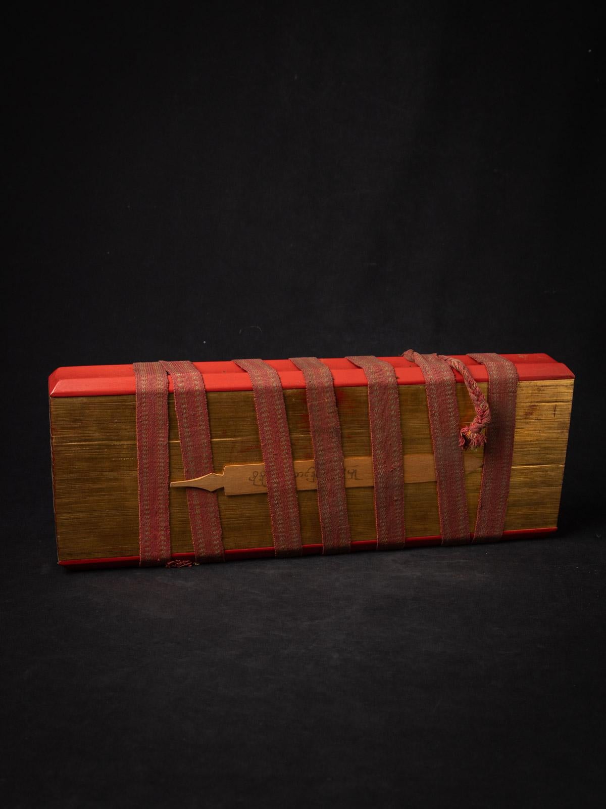The Antique Palm Leave Manuscript book is a remarkable significant artifact originating from Burma. Crafted from Palm leaves & wood, it stands at 19,5 cm in height and measures 51,3 cm in width and 6,5 cm in depth. 

Created in the 19th century, Was