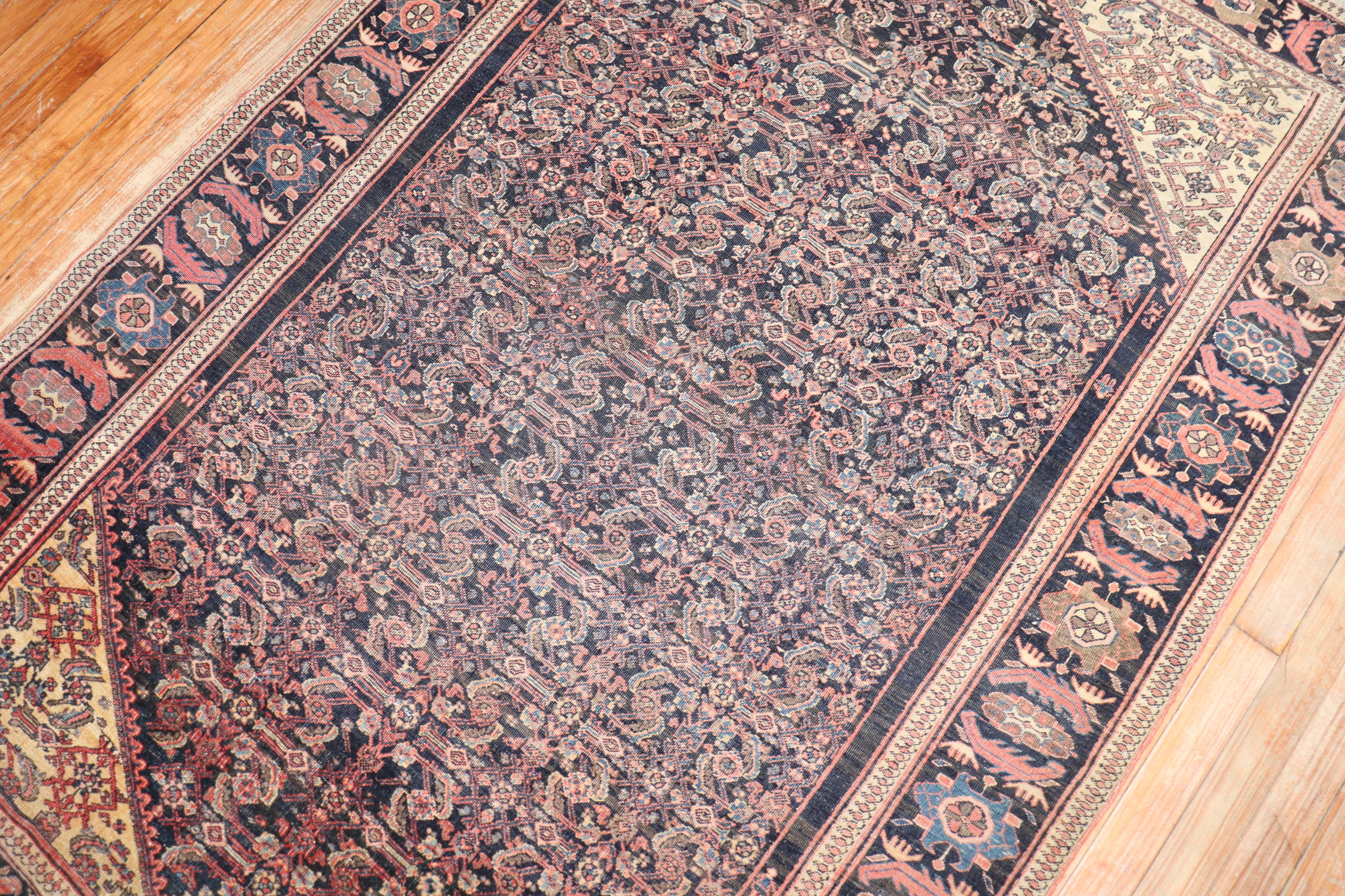 An authentic Persian Sarouk Farahan rug from the last quarter of the 19th century with a Classic all-over Herati motif. on a navy ground.

Measures: 4'2'' x 6'.
