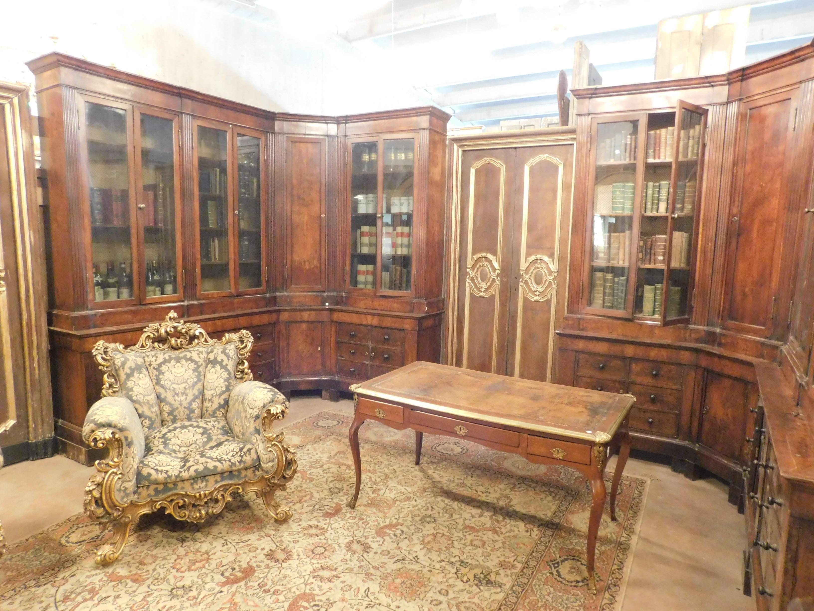 Antique pharmacy used as a library, complete and in excellent conditions, original glasses for the windows,
with drawers turned into doors, formed by two bodies in walnut, restored.
If you want there are the matching doors.