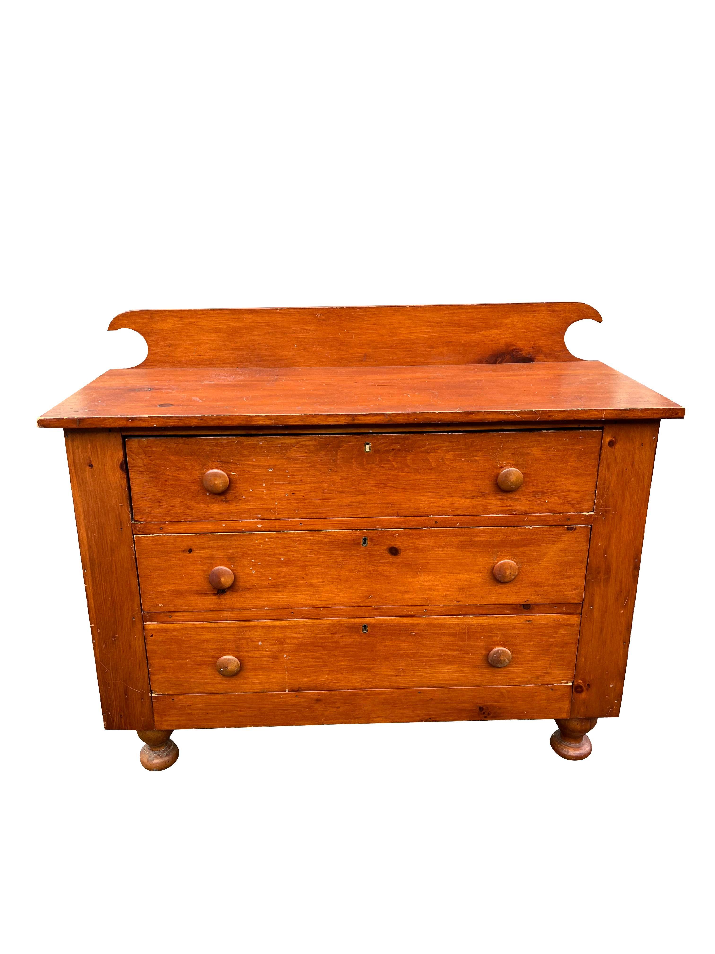 19th Century Antique Primitive Pine or Maple Chest of Drawers.

Add a touch of rustic charm to your home with this antique primitive chest of drawers. This piece showcases the beauty of natural wood and the craftsmanship of a bygone era.

Key