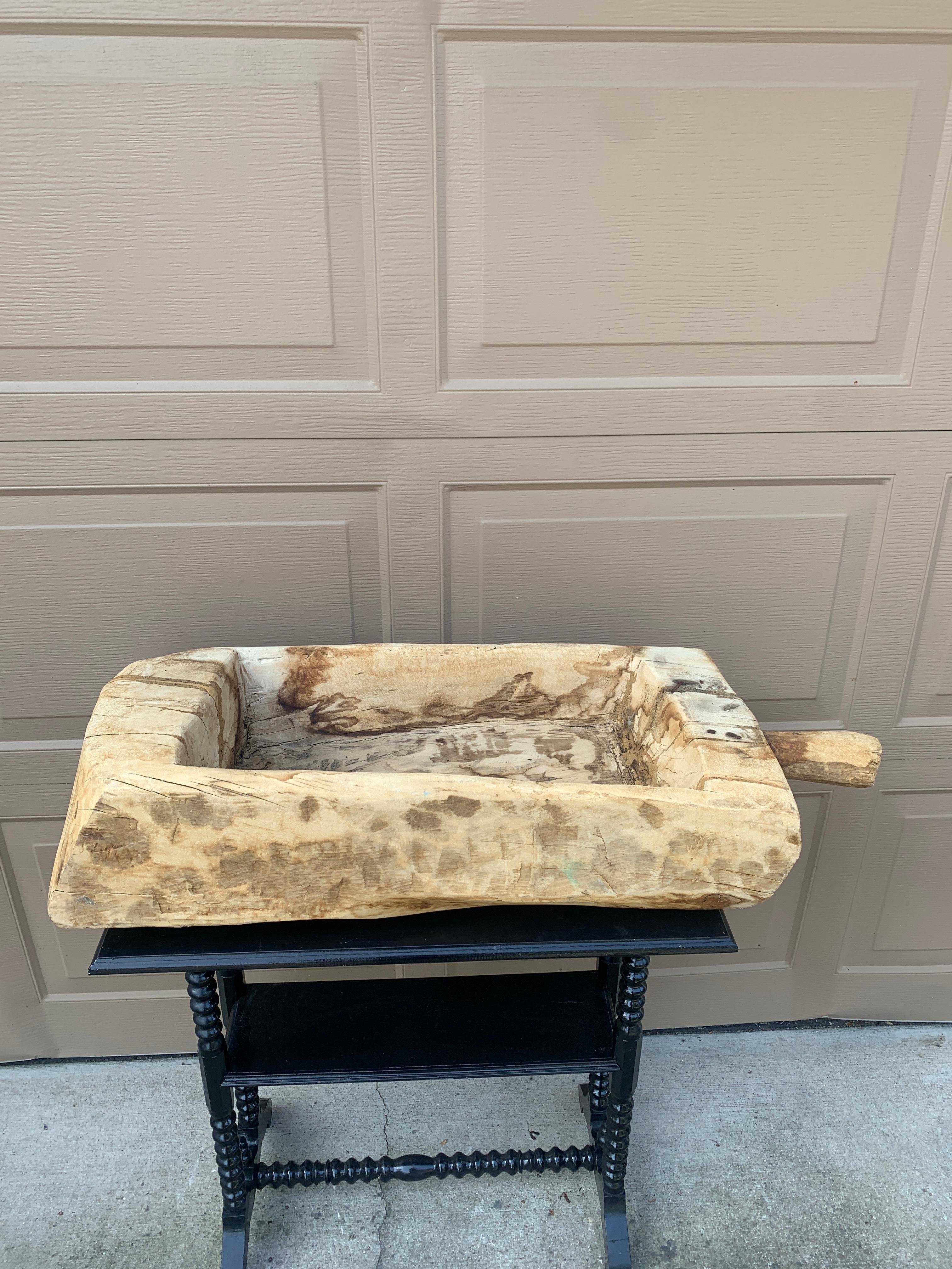 A beautiful antique French hand-made trough or bowl which would have been used in the process of making cheese or dough in the French countryside. This piece would add character and charm to any space, particularly in the kitchen or dining room. Its