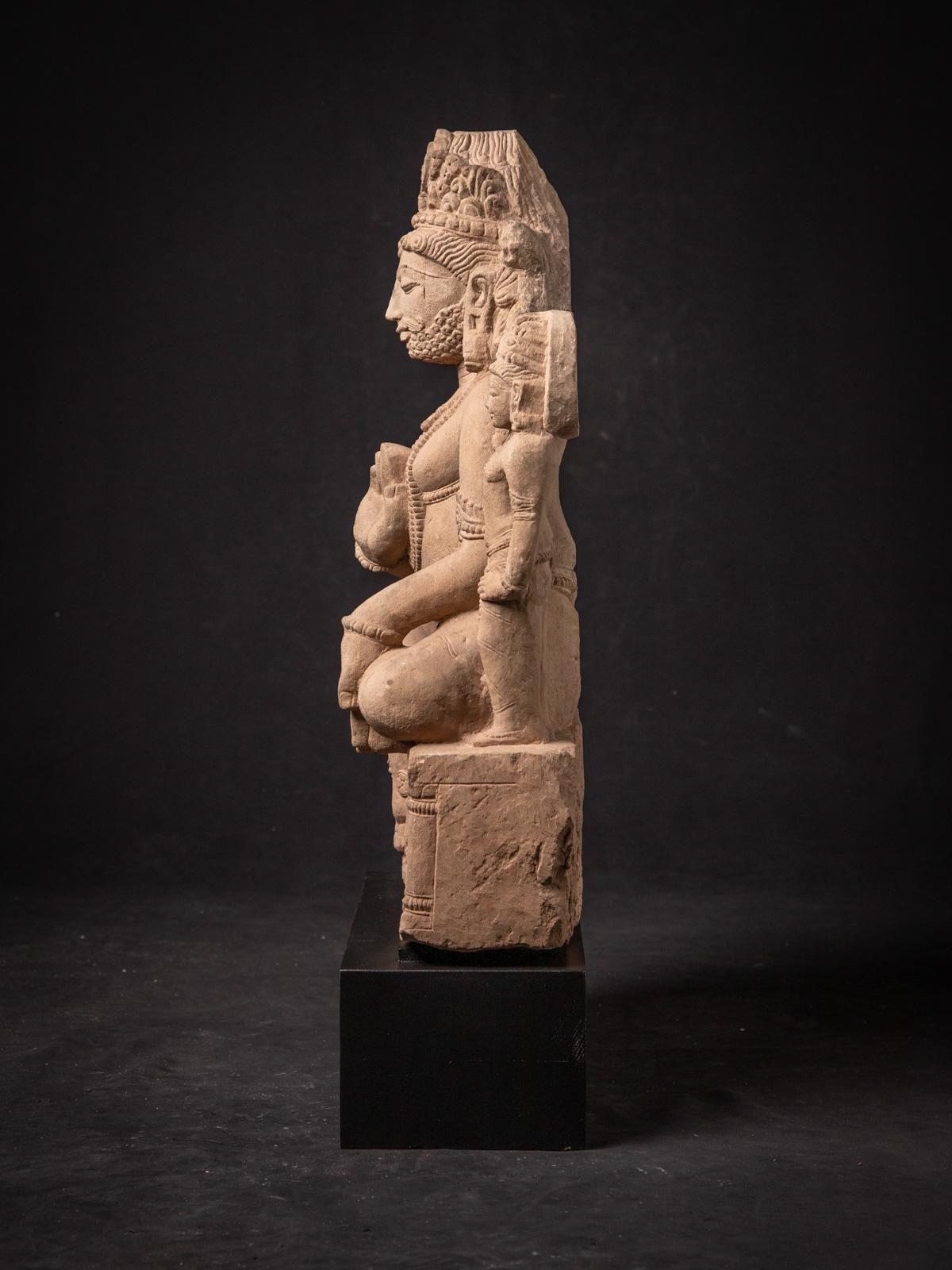 Indian 19th century antique sandstone statue of the god Kuber from India For Sale
