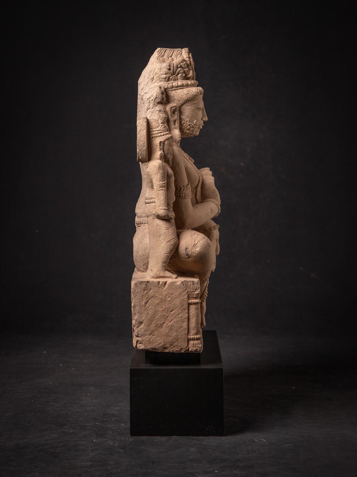 19th Century 19th century antique sandstone statue of the god Kuber from India For Sale