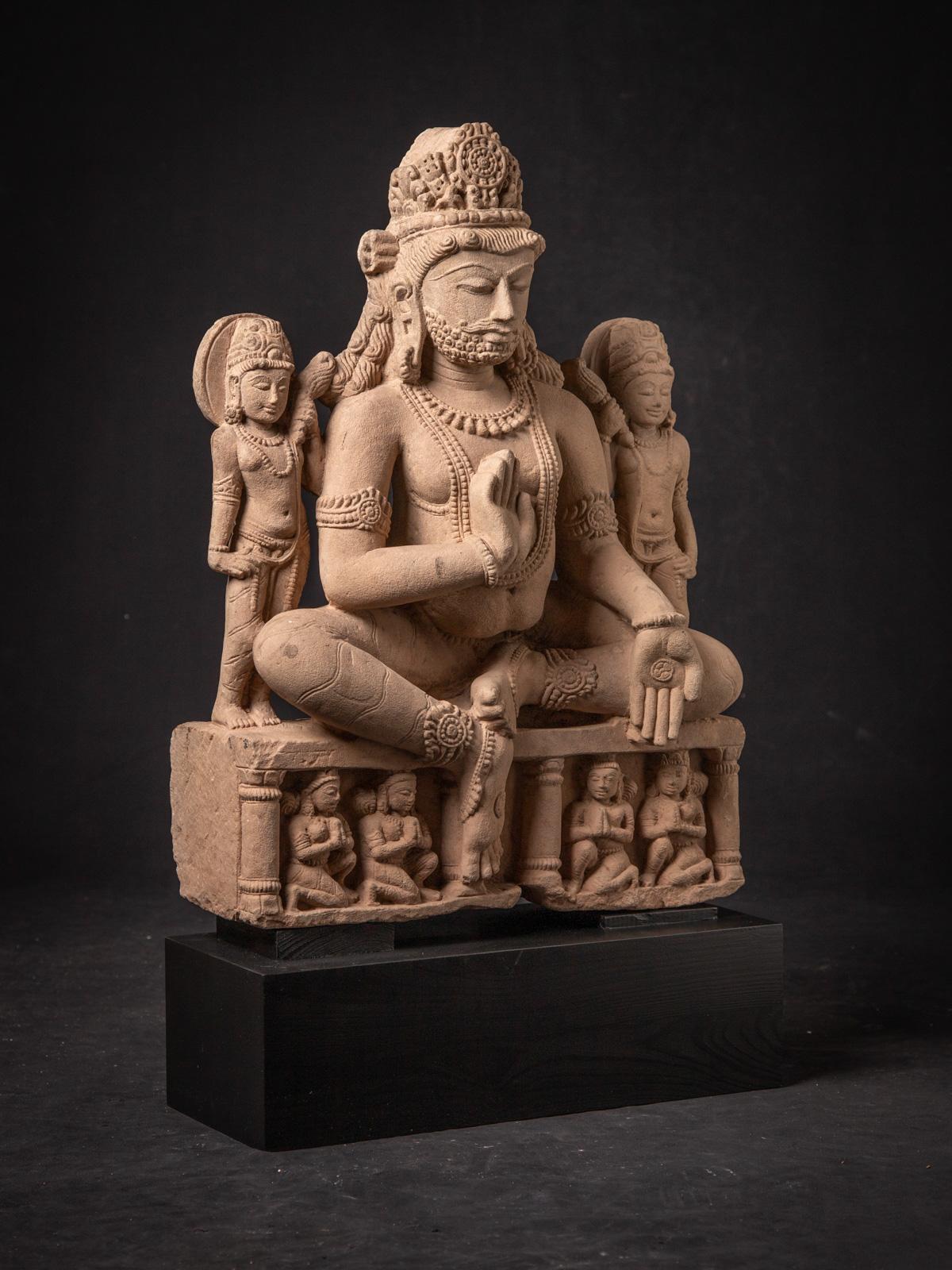 Sandstone 19th century antique sandstone statue of the god Kuber from India For Sale
