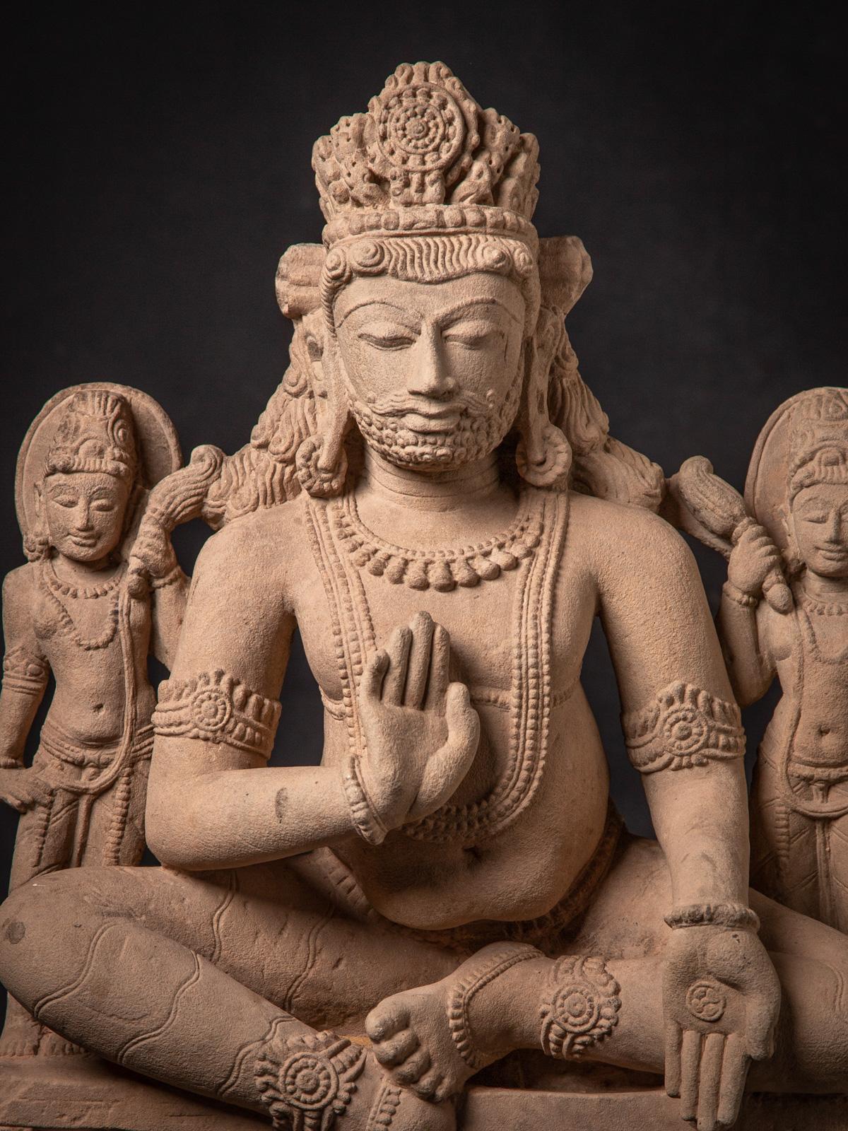 Sandstone 19th century antique sandstone statue of the god Kuber from India