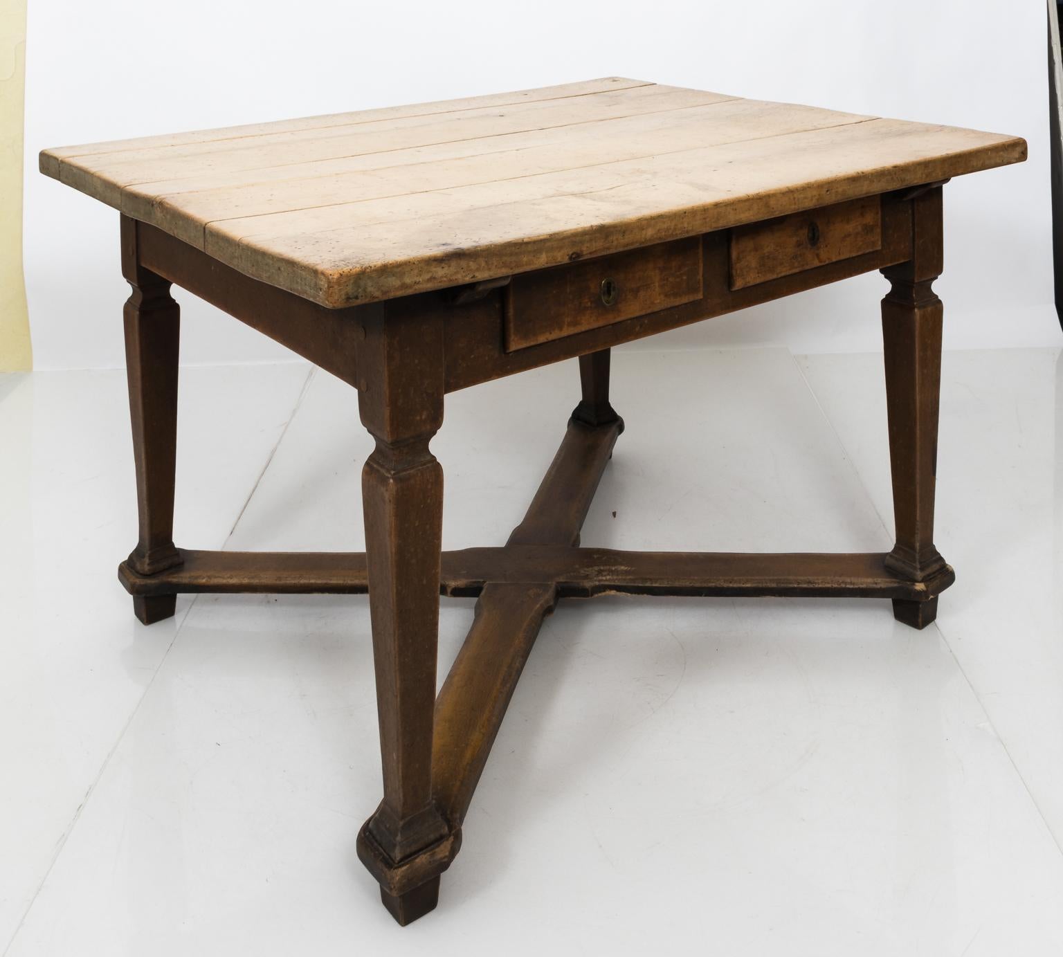 19th century antique Scandinavian farm table with two drawers. Please note of wear consistent with age including an unstable tabletop due to a loose joinery on the corner.
  