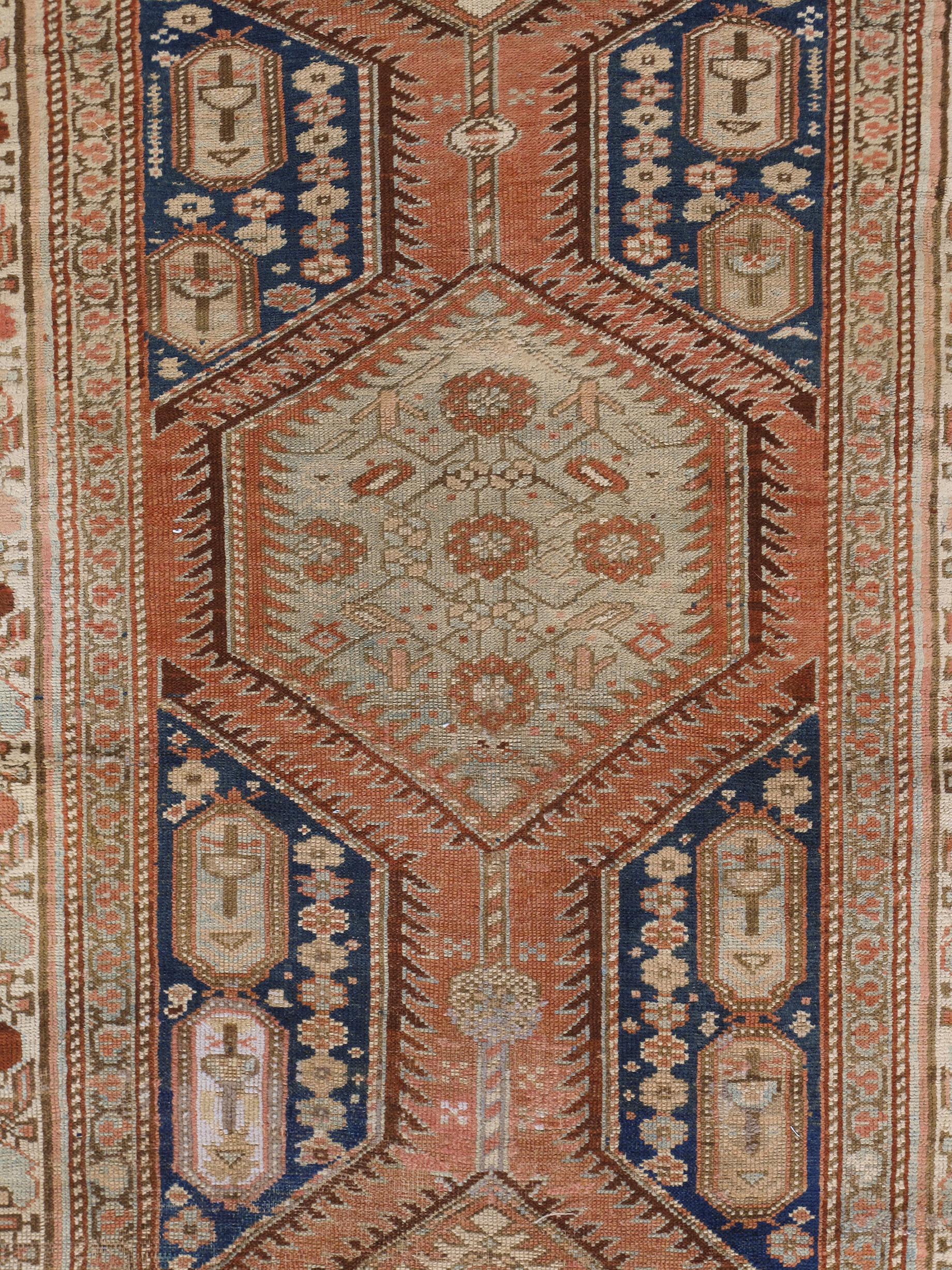 This runner resembles the rare and collectible antique Serab rugs that were produced in the 19th century and earlier.  Due to their limited availability, NASIRI revived the ancient dyeing and weaving techniques that had dissolved over the years to