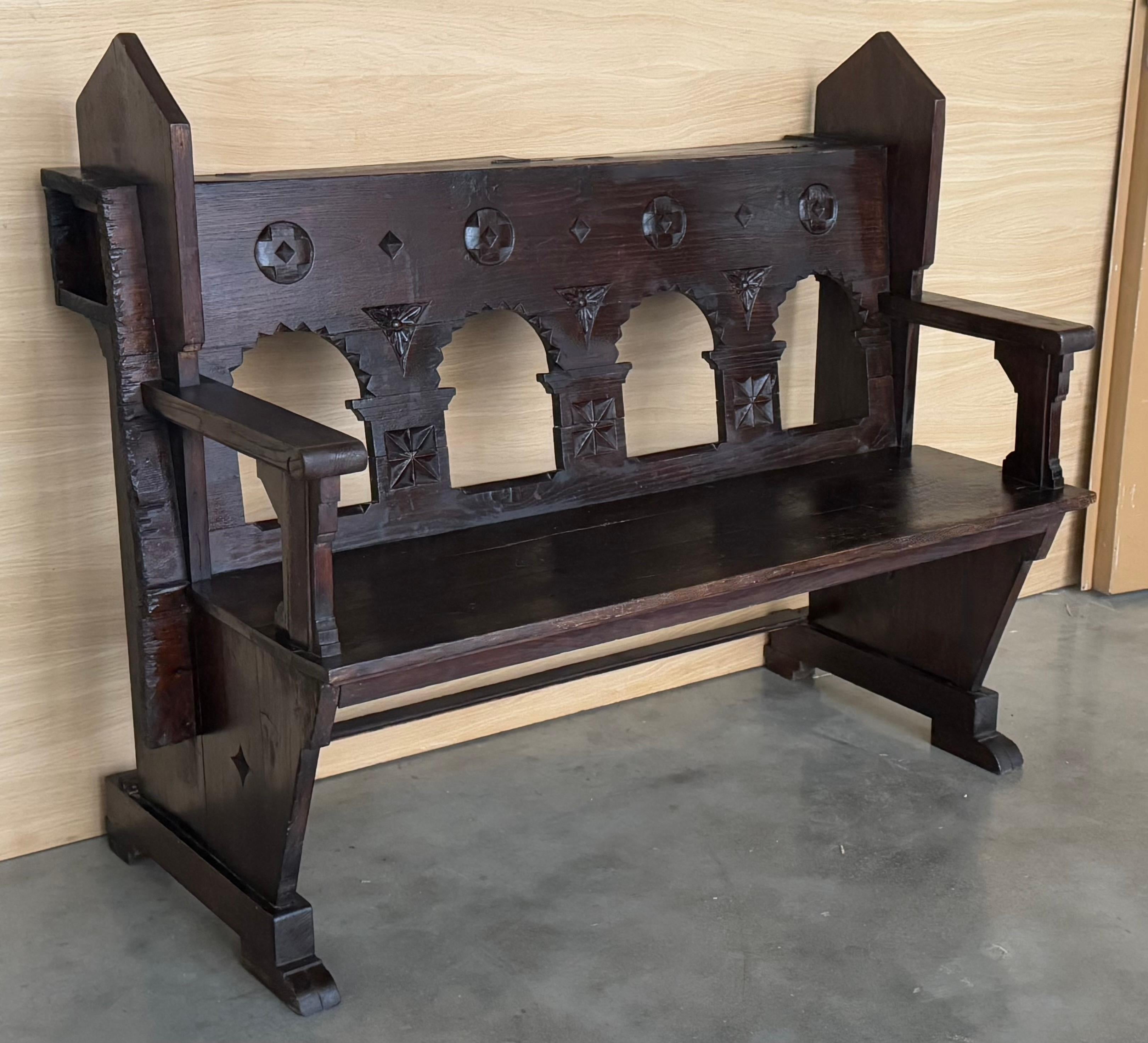 Spanish 19th Century Antique Solid Oak Church bench in Gothic style with storage For Sale
