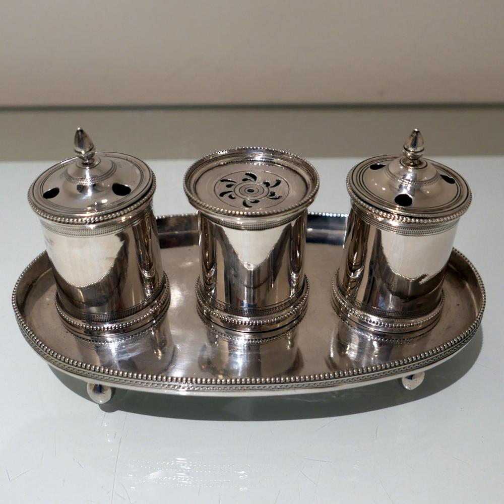 An elegant and highly collectable early 19th century Spanish provincial plain formed oval inkstand made by Mateo Mtz Moreno with stylish applied bead borders for highlights.

 

Weight: 28.26 troy ounces/879 grams

Measures: Height 4.75