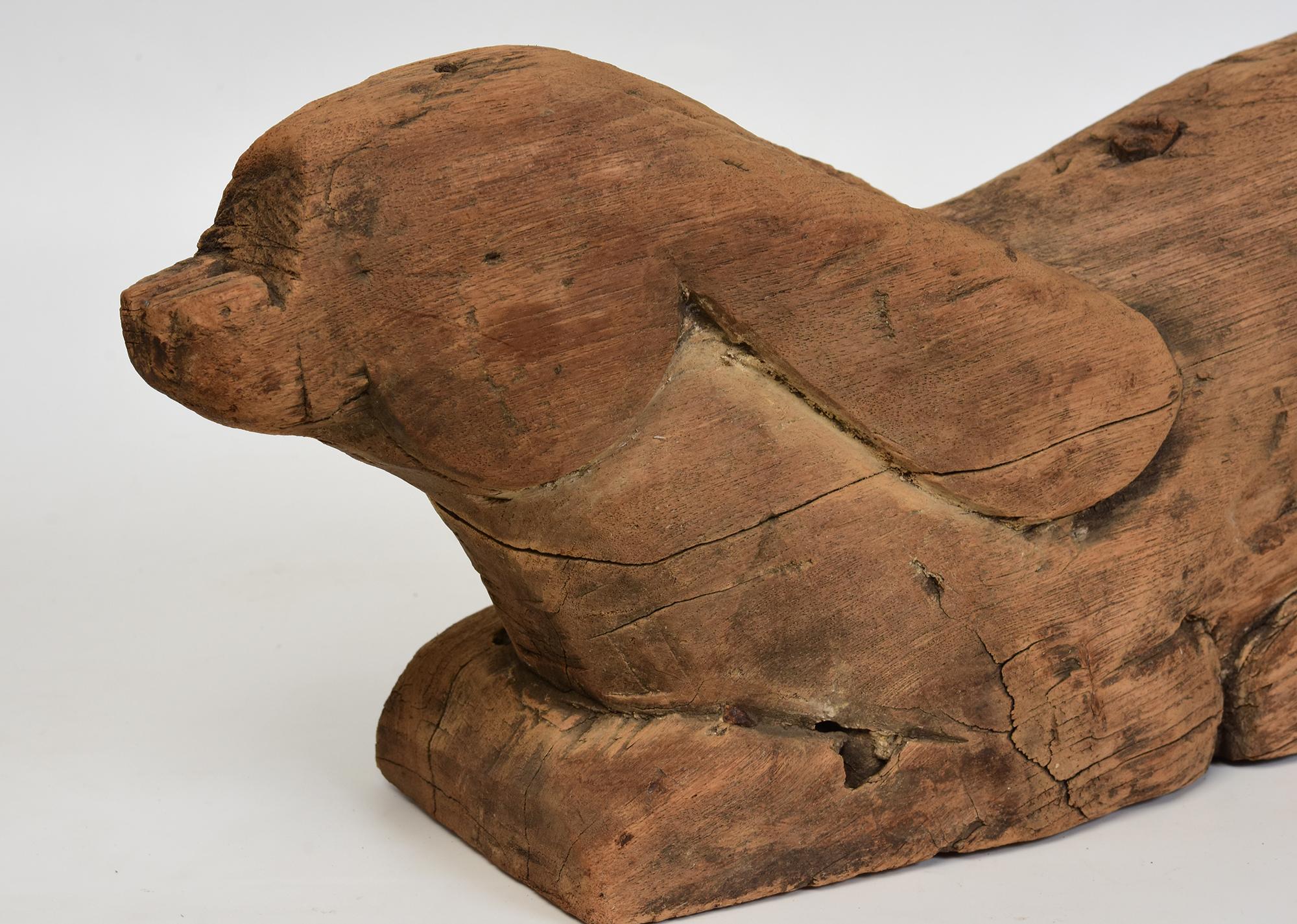 Antique Thai wooden rabbit.

Age: Thailand, 19th Century
Size: Length 44.5 C.M. / Width 13 C.M. / Height 19 C.M.
Condition: Nice condition overall (some expected degradation due to its age).

100% Satisfaction and authenticity guaranteed with free