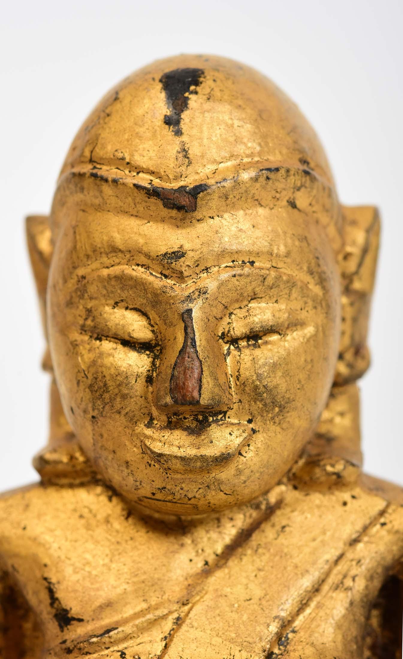 Antique Thai wooden seated Happy Buddha with gilded gold.

Age: Thailand, 19th Century
Size: Height 9.5 C.M. / Width 5 C.M. / Thickness 3.7 C.M.
Condition: Nice condition overall (some expected degradation due to its age).

100% Satisfaction and