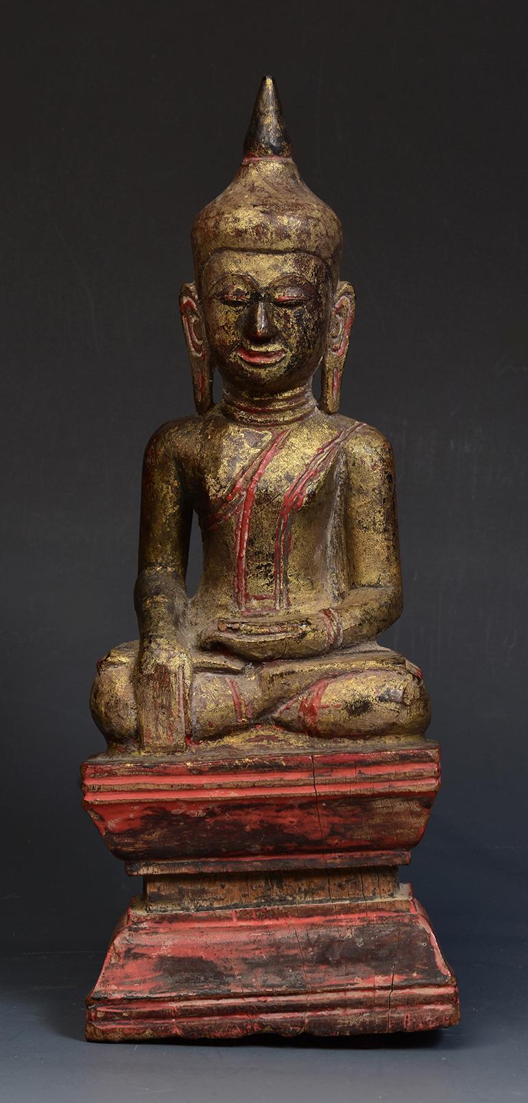 Thai wooden Buddha sitting in Mara Vijaya (calling the earth to witness) posture on a base.

Age: Thailand, 19th Century
Size: Height 24.9 C.M. / Width 19.5 C.M.
Condition: Nice condition overall (some expected degradation due to its