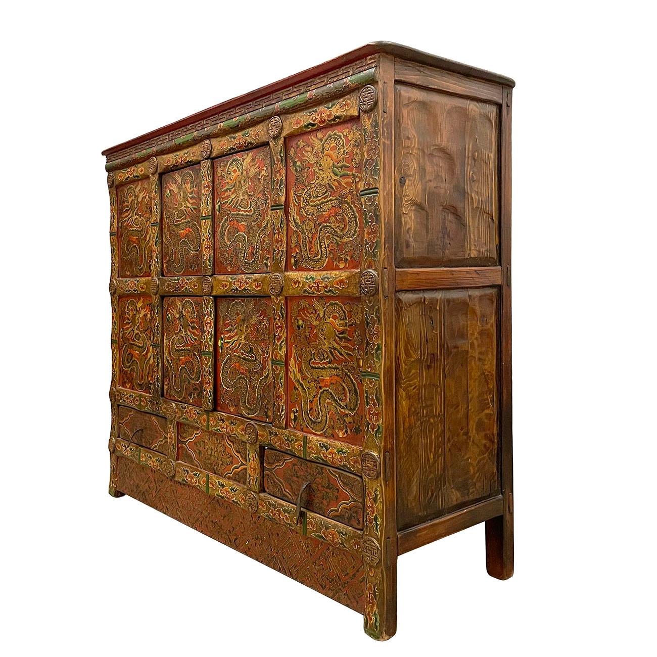 This Antique Tibetan Painted Cabinet is 100% hand made and hand painted using mineral painting which last the paint a much longer time. You can see some of the finish has already lost. This Cabinet has 2 double removable doors compartments and two