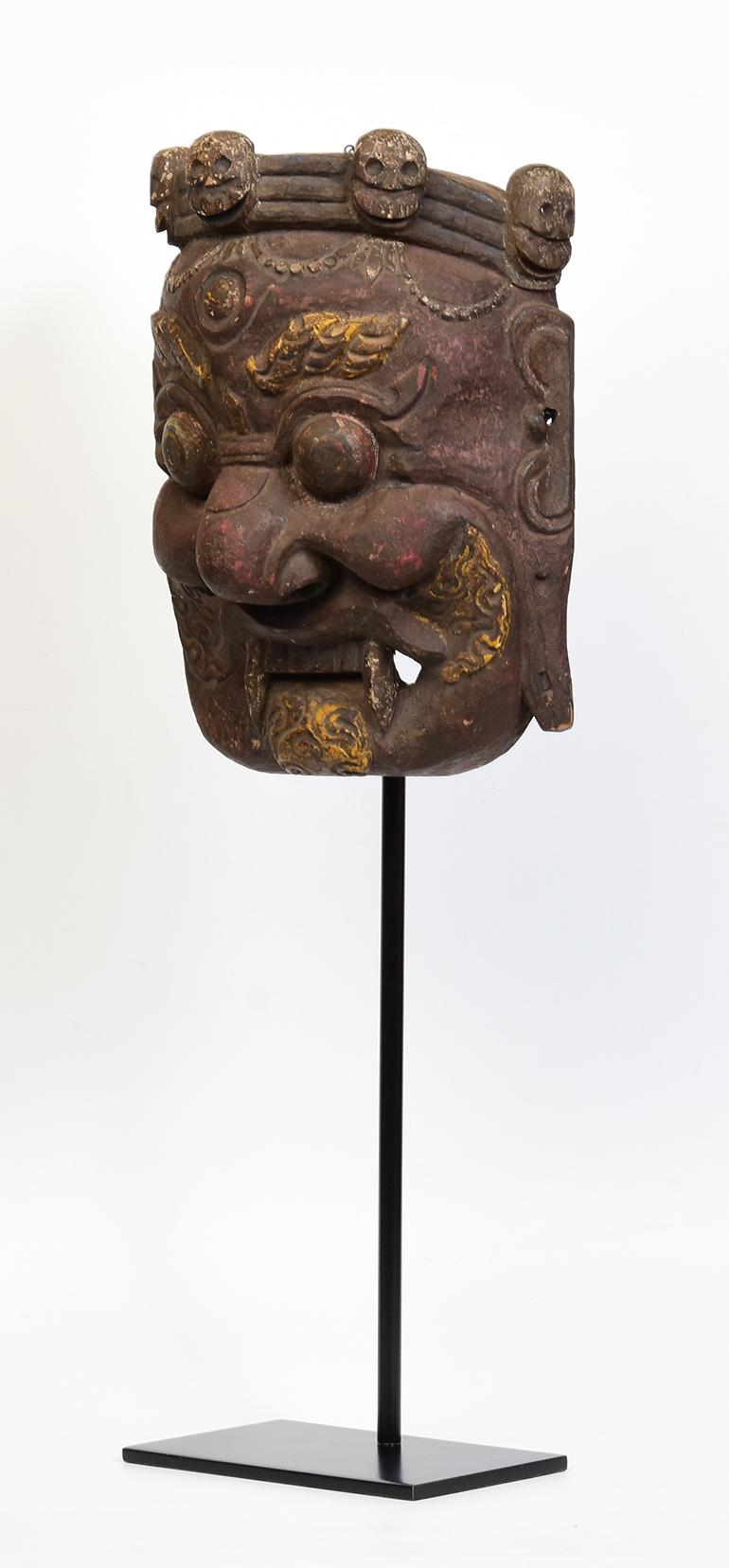 19th Century, Antique Tibetan Wooden Buddhist Mahakala Mask with Stand In Good Condition For Sale In Sampantawong, TH