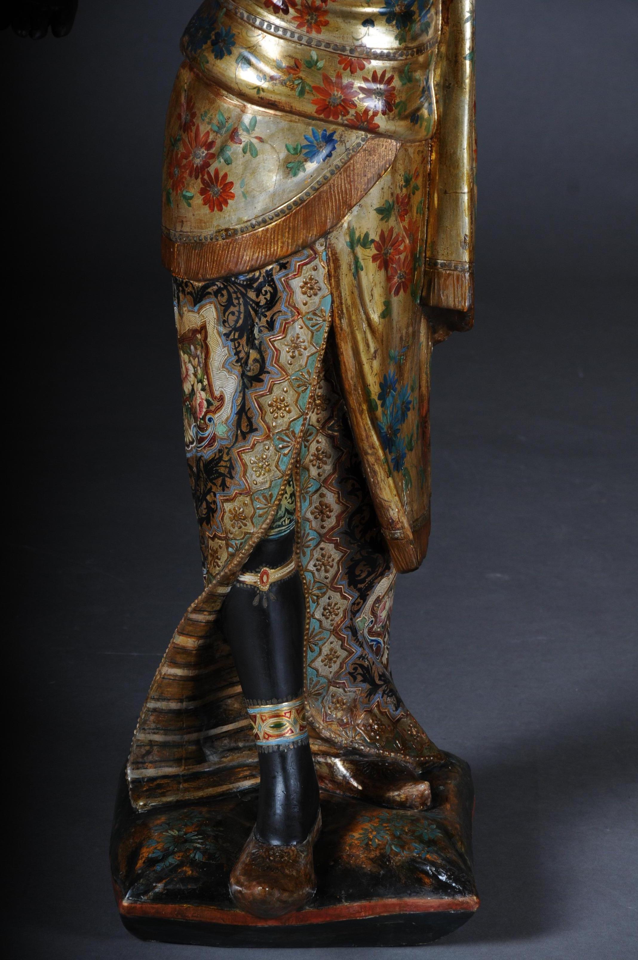 19th century antique Venetian Mohren chandelier wood sculpture

Standing on pillows in oriental robe and in her right hand a fire bowl as a candleholder. Probably Northern Italy / Venice, late 19th century
Fairytale and colorful painting.
Wood