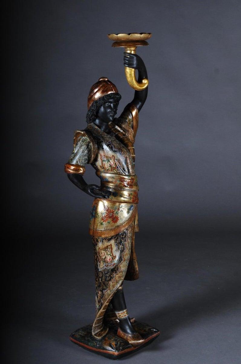 19th century antique Venetian Mohren chandelier wood sculpture

Standing on pillows in oriental robe and in her right hand a fire bowl as a candleholder. Probably Northern Italy / Venice, late 19th century
Fairytale and colorful painting.
Wood