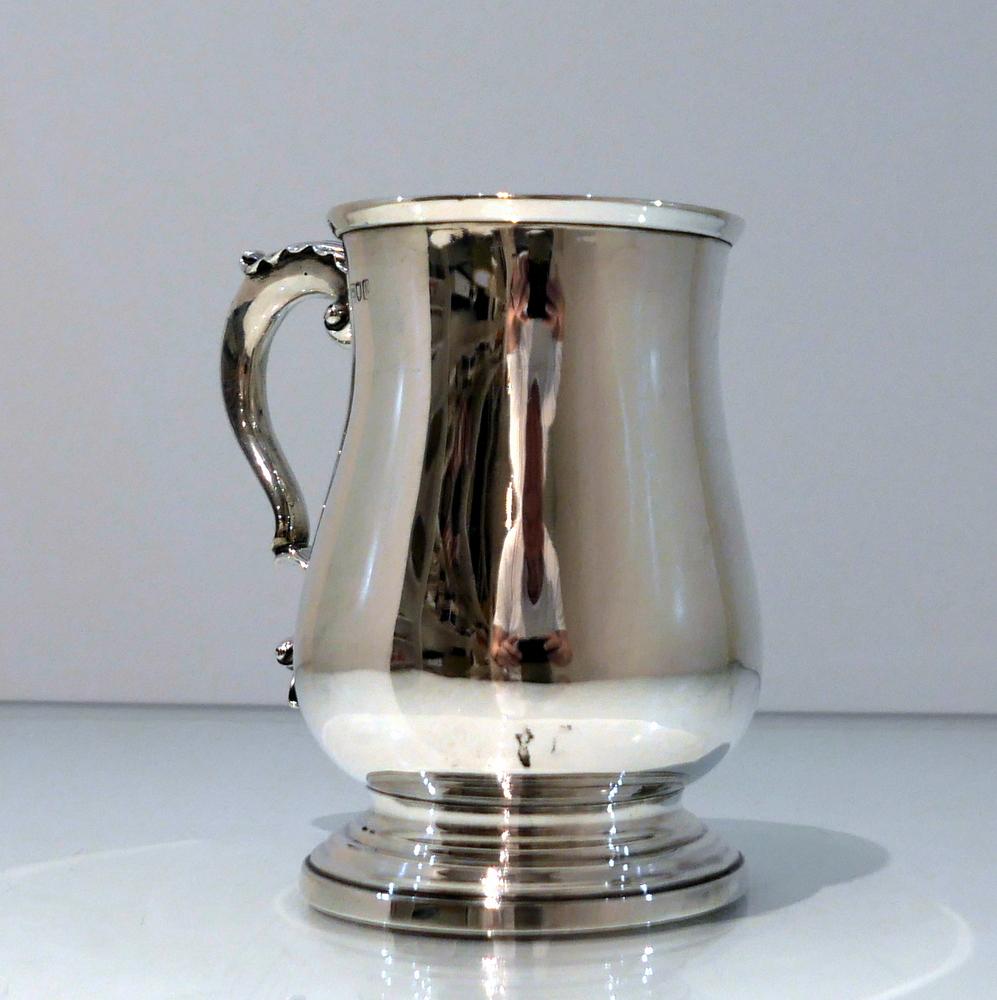 A fine and extremely elegant 19th century Victorian silver plain formed baluster pint mug with applied double scroll handle which is mounted with a stylish acanthus leaf thumbpiece.

 

Weight: 10.7 troy ounces/334 grams

Measures: Height 5.3