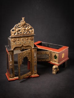 19th century antique wooden Burmese Buddha temple in Mandalay style
