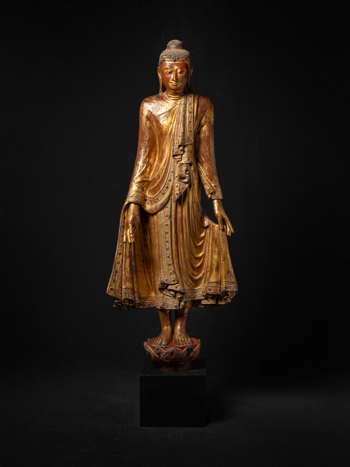 Unveil the timeless elegance of this Antique wooden Burmese Mandalay Buddha statue, a breathtaking 19th-century masterpiece that epitomizes the spiritual and artistic grandeur of Myanmar’s Mandalay craftsmanship. Carved from premium wood and adorned