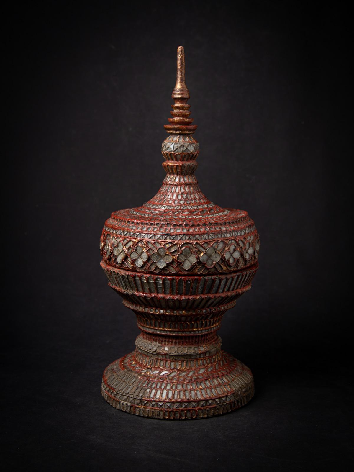 Discover the elegance of Burmese craftsmanship with this antique wooden Burmese offering vessel, a stunning 19th-century artifact in the Shan (Tai Yai) style. Standing 60 cm high with a 27.5 cm diameter, this exquisite vessel is gilded with 24-karat
