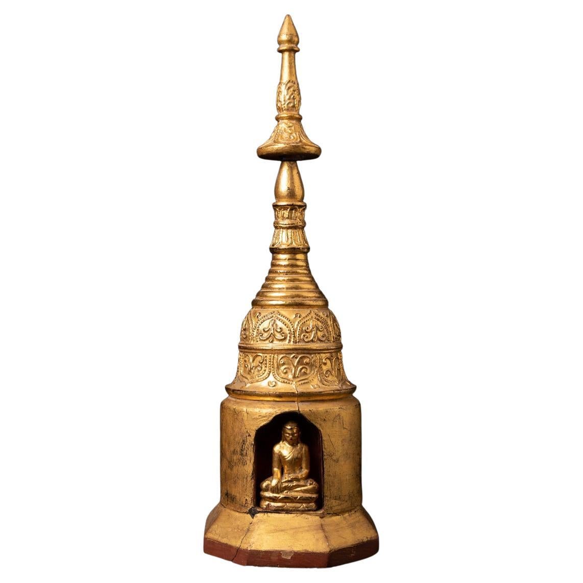 19th century antique wooden stupa with Buddha inside in Bhumisparsha Mudra